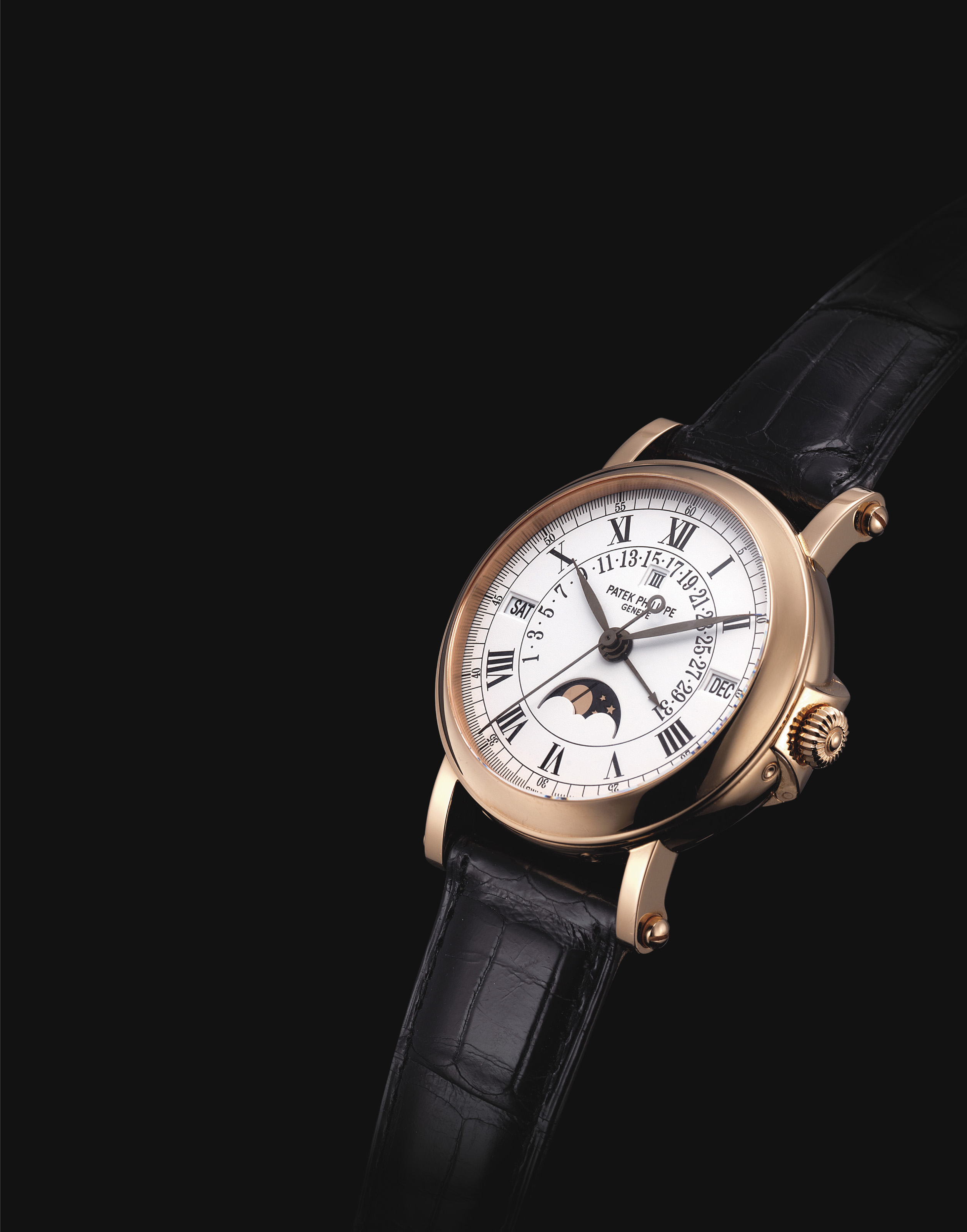 PATEK PHILIPPE. A FINE AND RARE 18K PINK GOLD AUTOMATIC ...