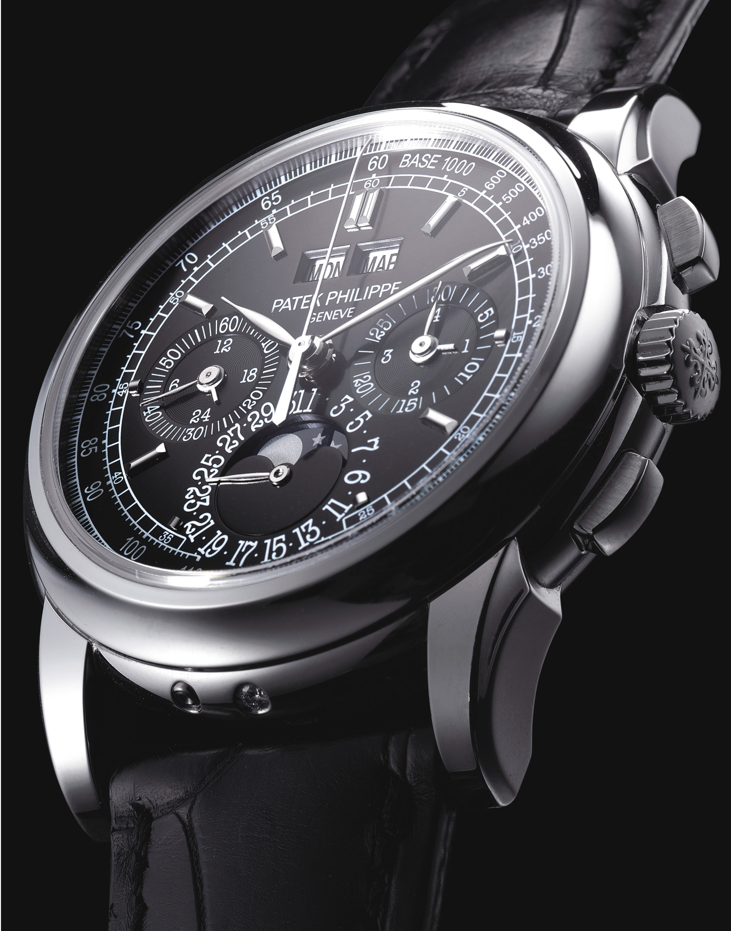 PATEK PHILIPPE. A FINE AND RARE PLATINUM PERPETUAL CALENDAR CHRONOGRAPH