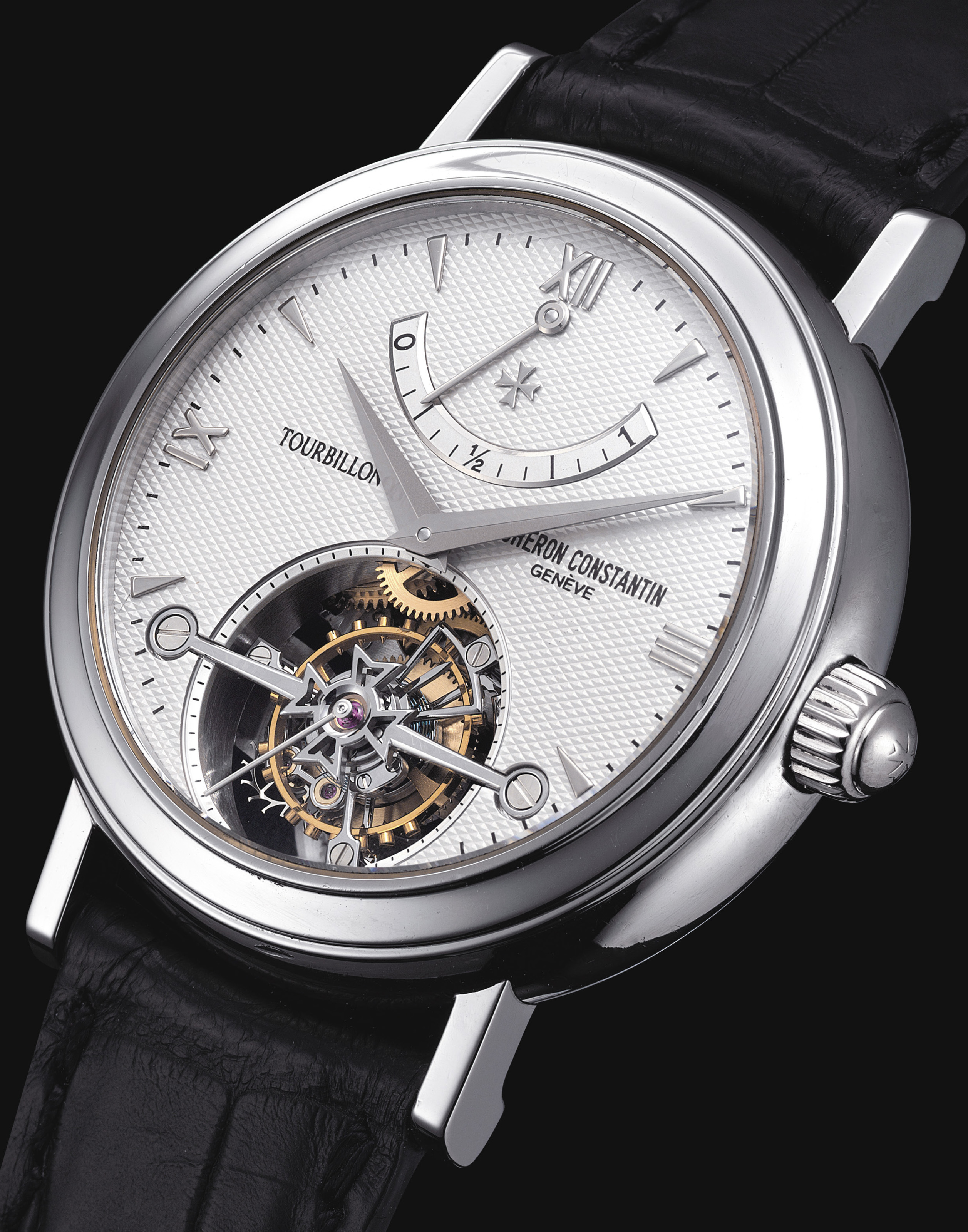 VACHERON CONSTANTIN. A FINE AND RARE PLATINUM TWIN BARREL TOURBILLON ...