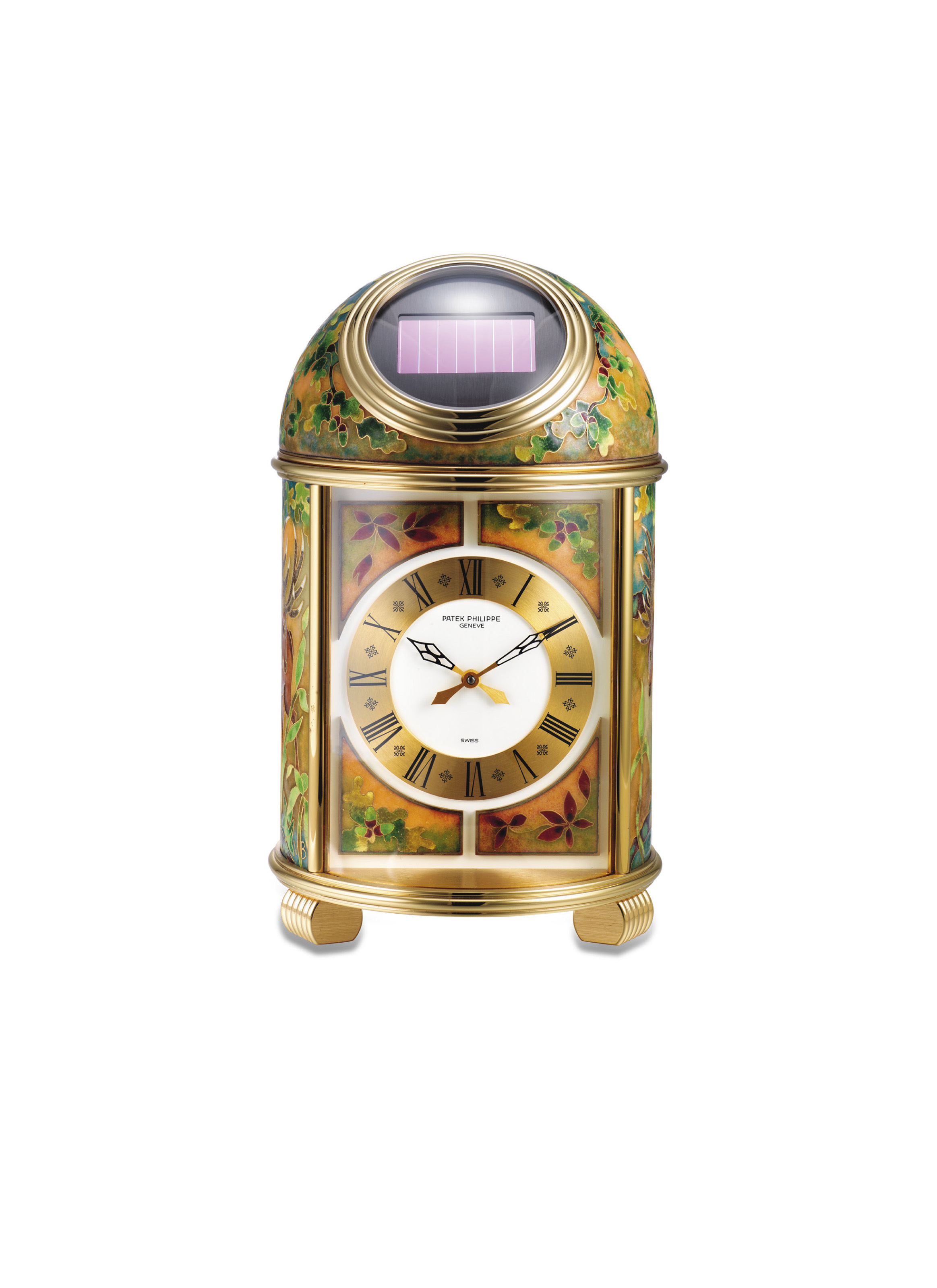 PATEK PHILIPPE. A VERY FINE AND UNIQUE GILT BRASS SOLARPOWERED DESK