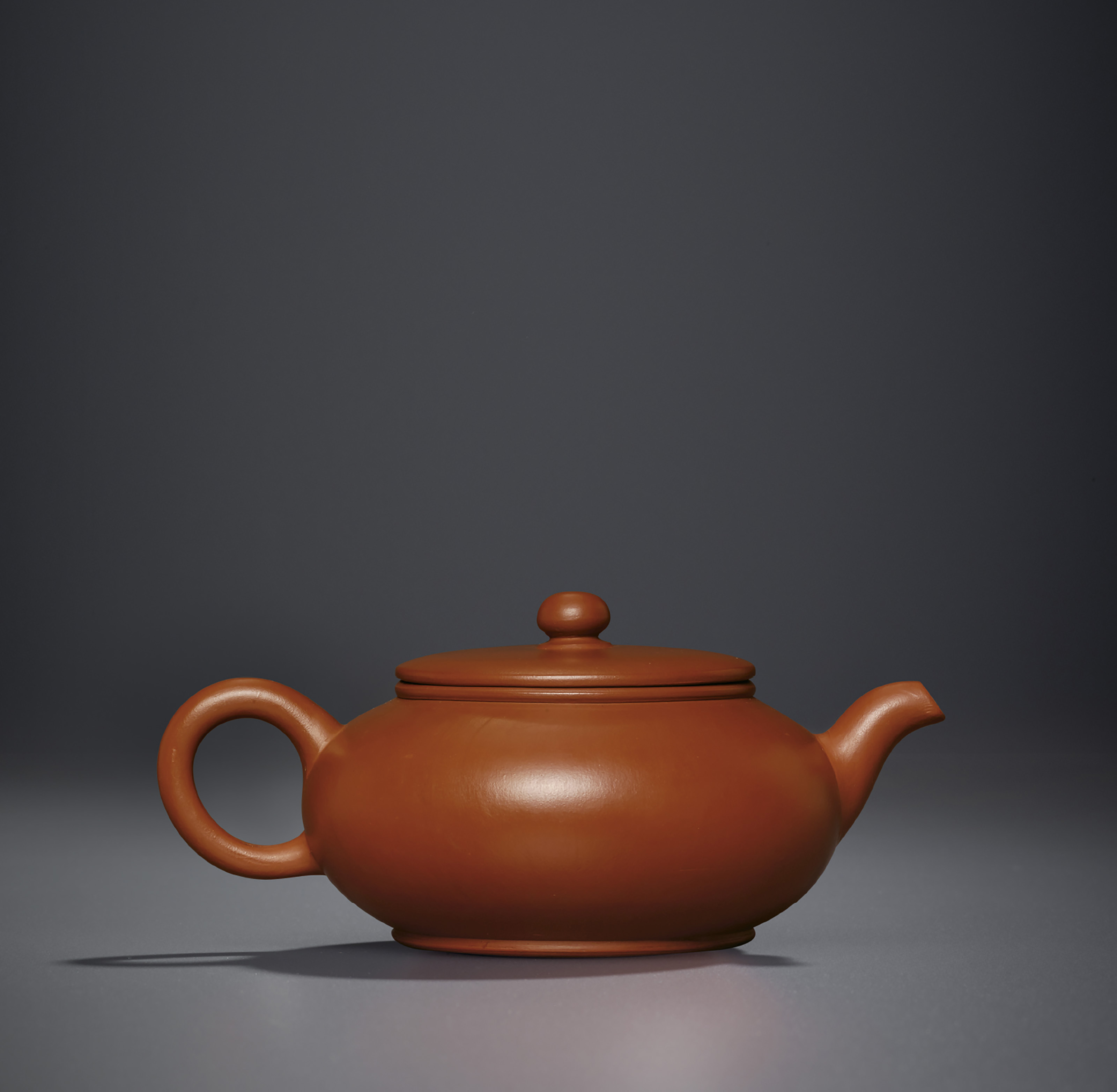 A SMALL YIXING TEAPOT , QING DYNASTY, 19TH CENTURY Christie's