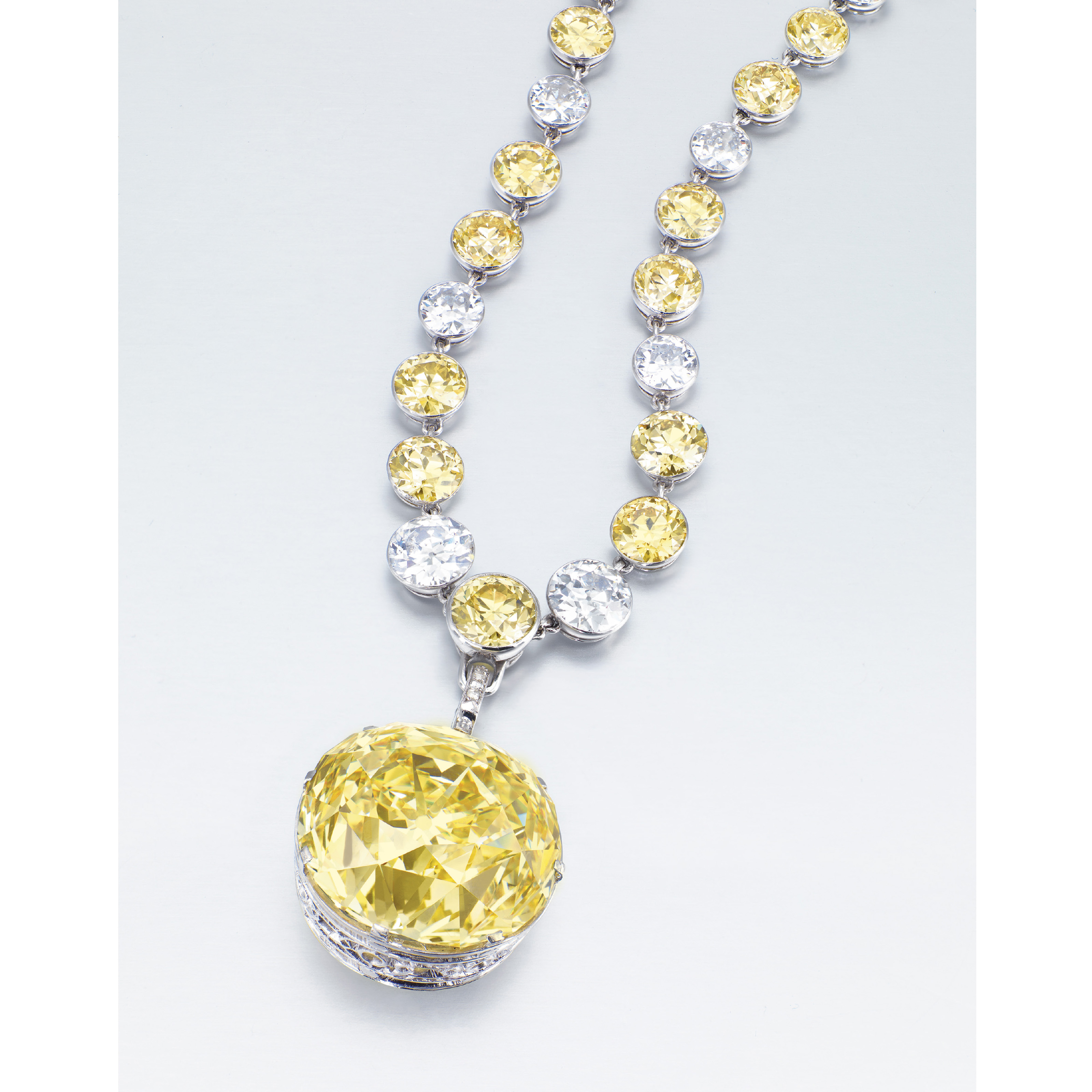 Image result for A UNIQUE BELLE ÃPOQUE COLOURED DIAMOND AND DIAMOND PENDANT NECKLACE