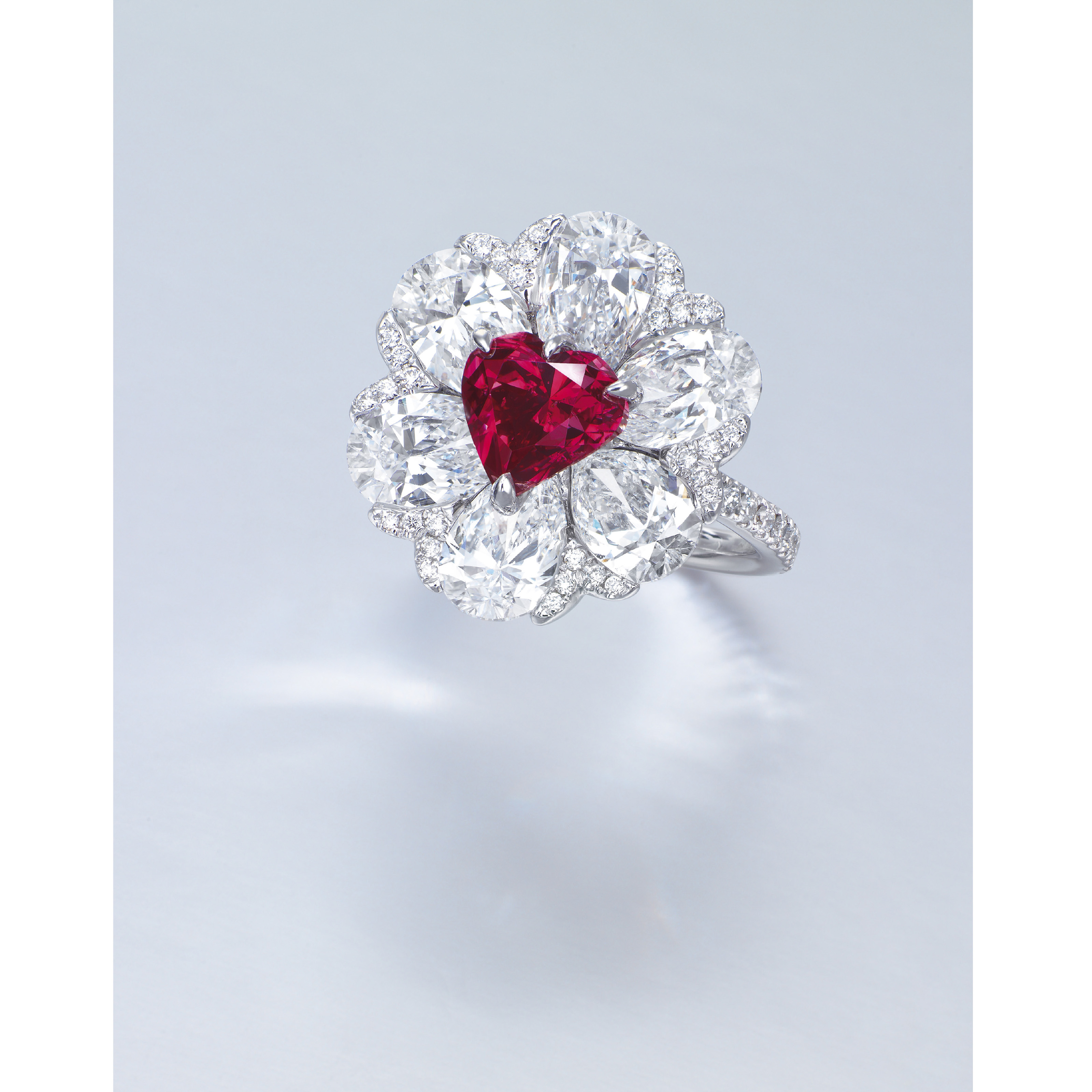 A STUNNING COLOURED DIAMOND AND DIAMOND RING BY MOUSSAIEFF