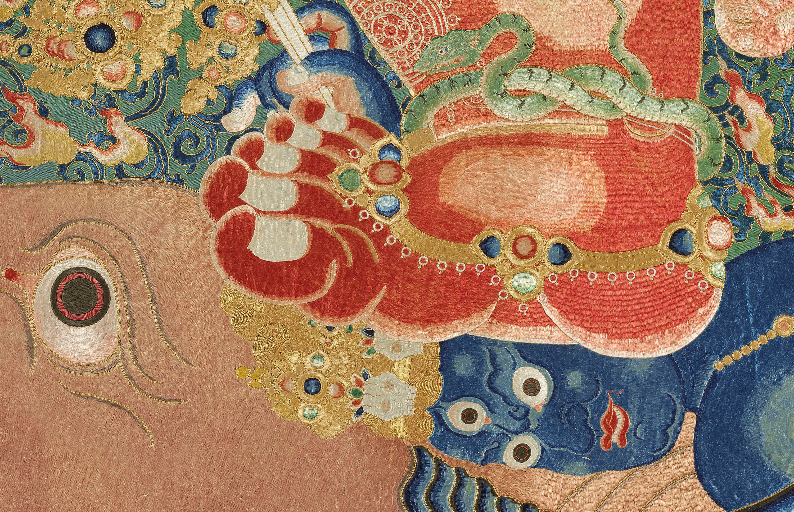 A HIGHLY IMPORTANT IMPERIAL EMBROIDERED SILK THANGKA