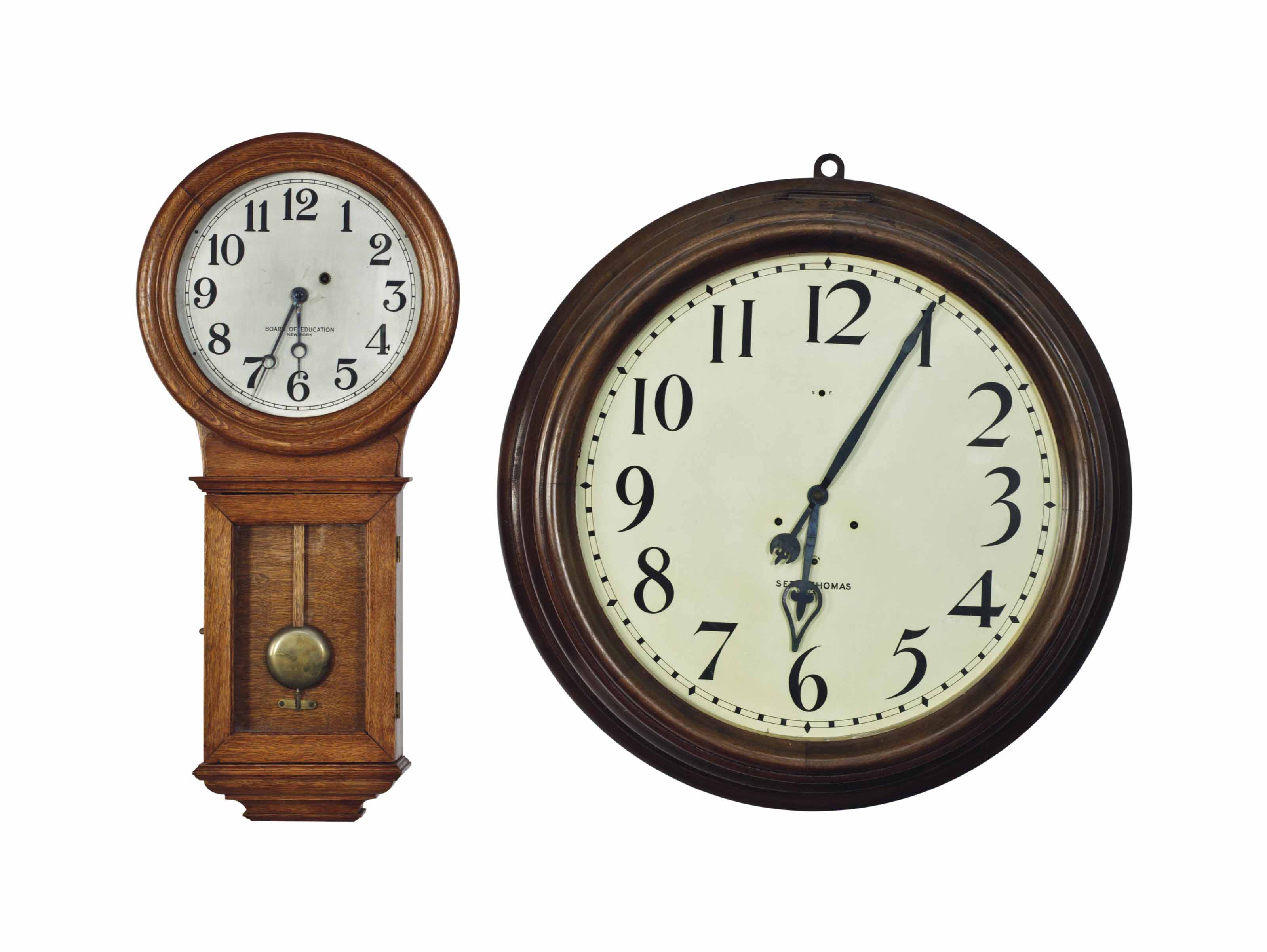 AN AMERICAN OAK PENDULUM CLOCK, AND A WALNUT CIRCULAR WALL CLOCK , 20TH