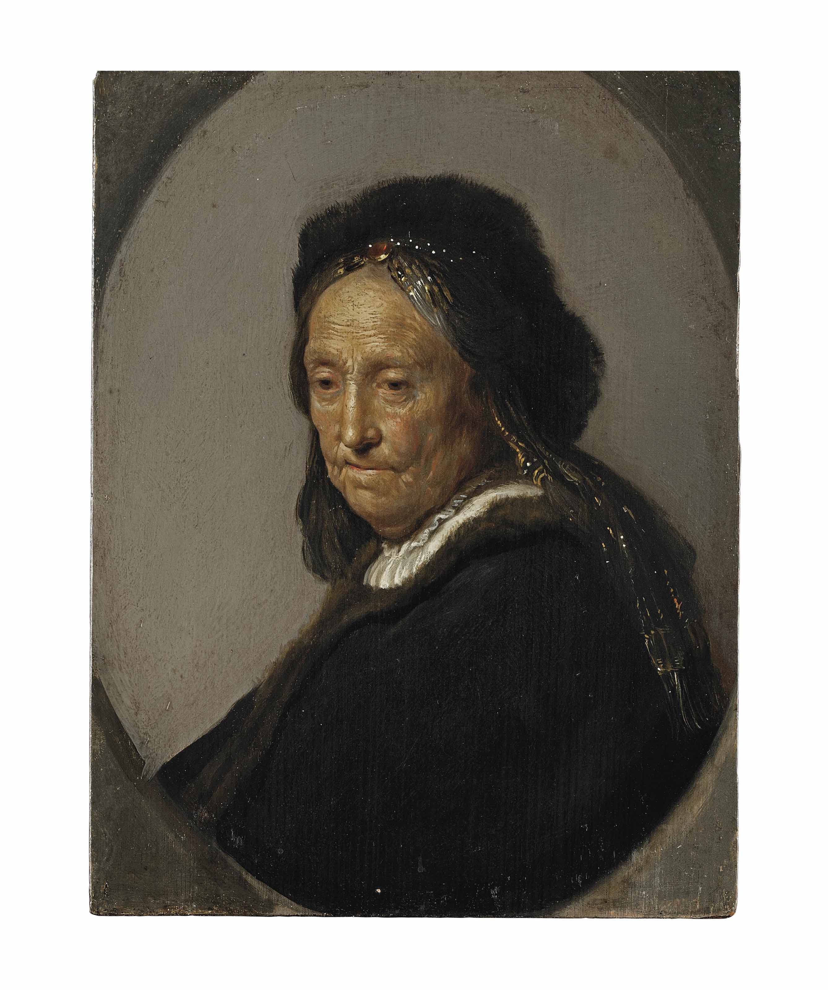 Head of an old woman, traditionally identified as Neeltgen Willemsdr. van Zuytbrouck (1569-1640), Rembrandt's mother, half-length, in a black costume with a fur hat
