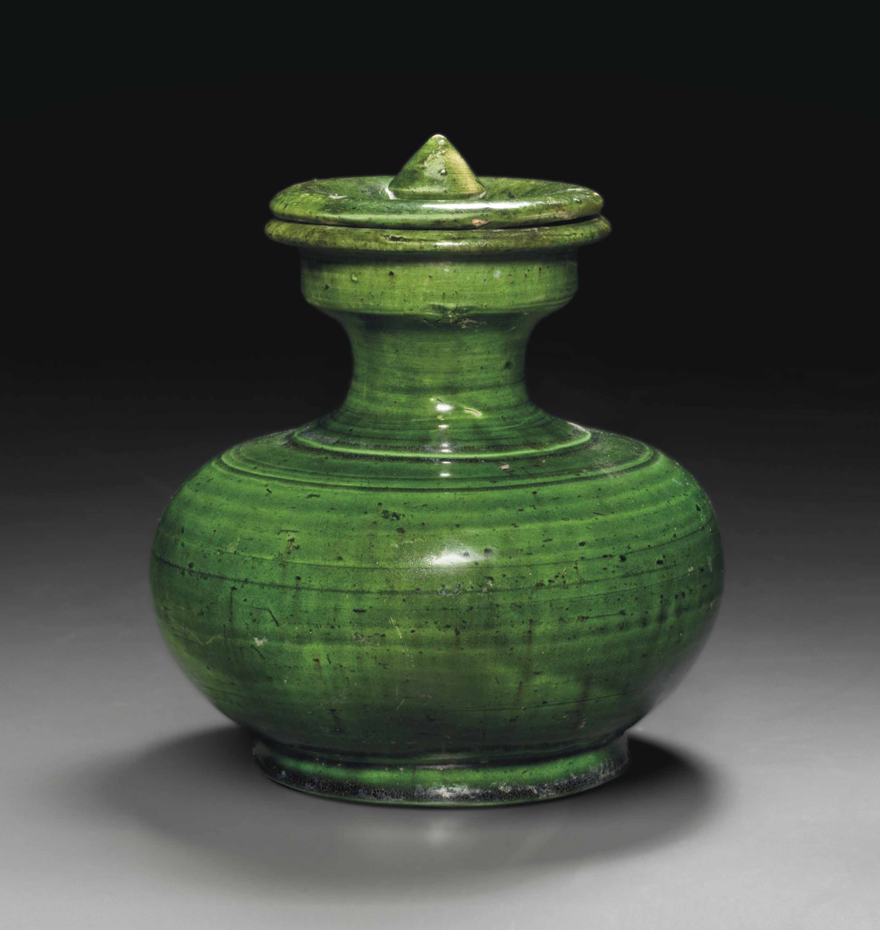 A GREENGLAZED POTTERY JAR AND COVER , TANG DYNASTY (AD 618907