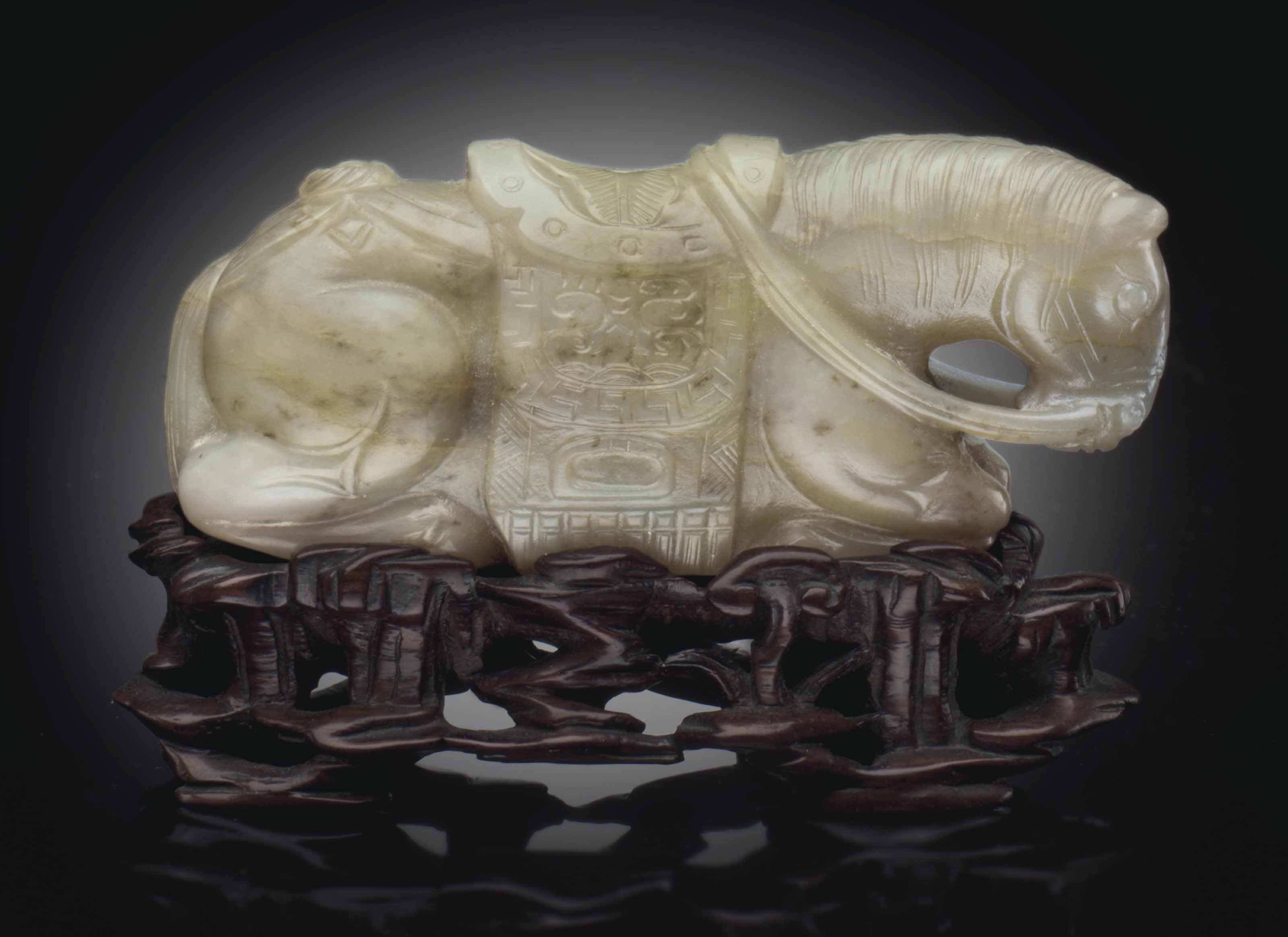 a-greyish-white-jade-carving-of-a-horse-yuan-ming-dynasty-13th-15th