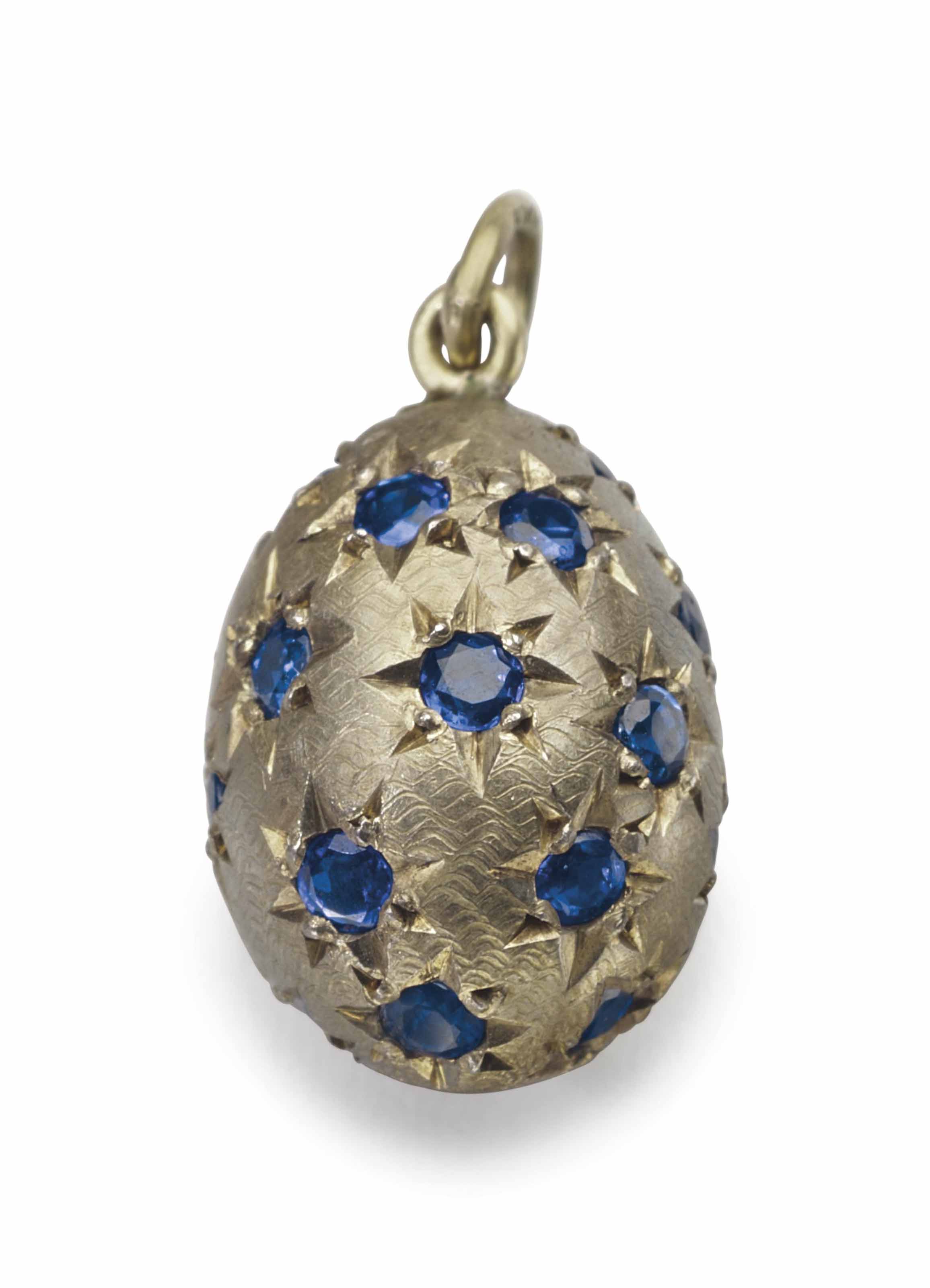 A JEWELED GOLD PENDANT EGG , MARKED FABERGÉ, ST. PETERSBURG, 1890