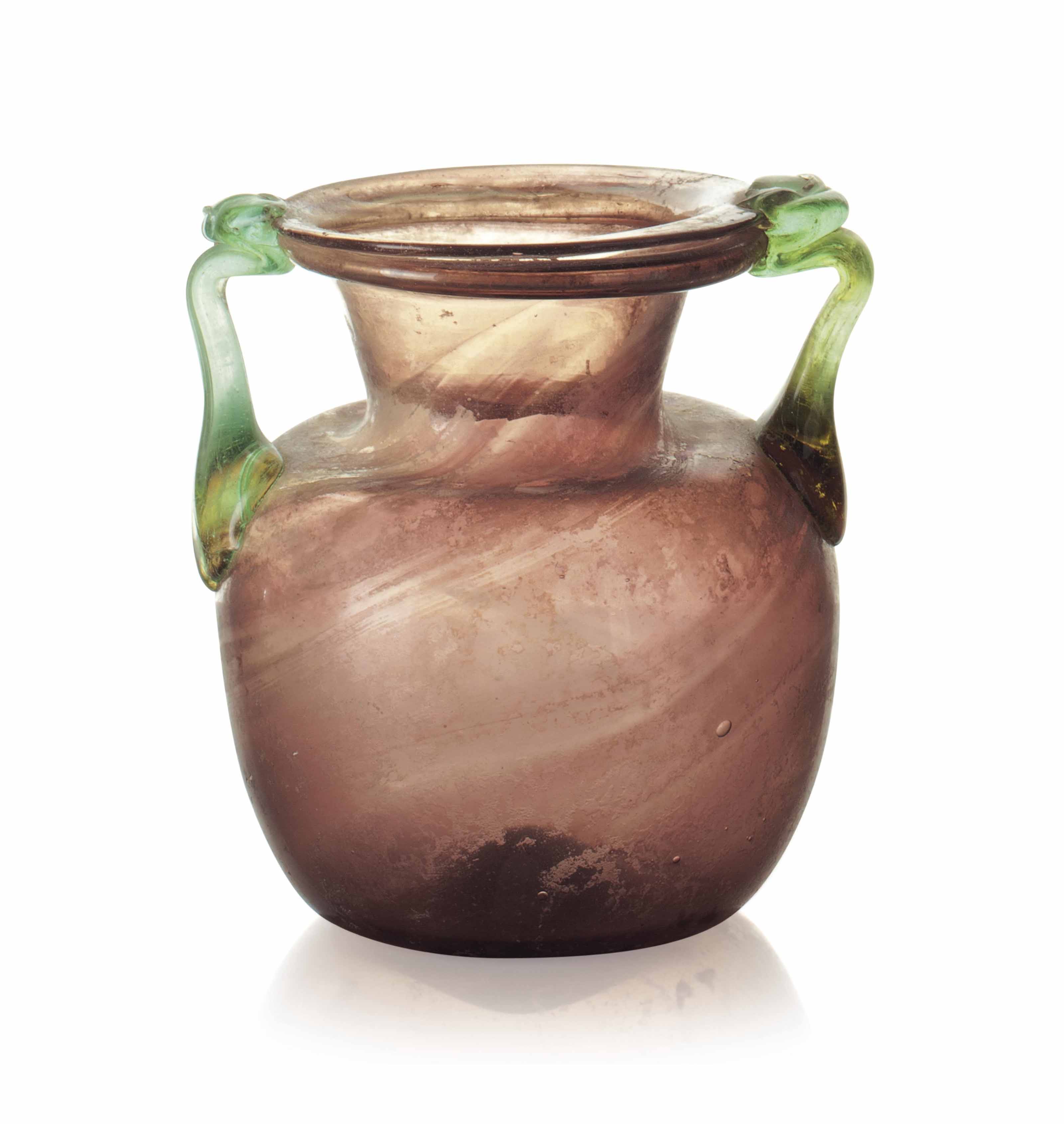 A ROMAN GLASS JAR , CIRCA 4TH CENTURY A.D. Christie's