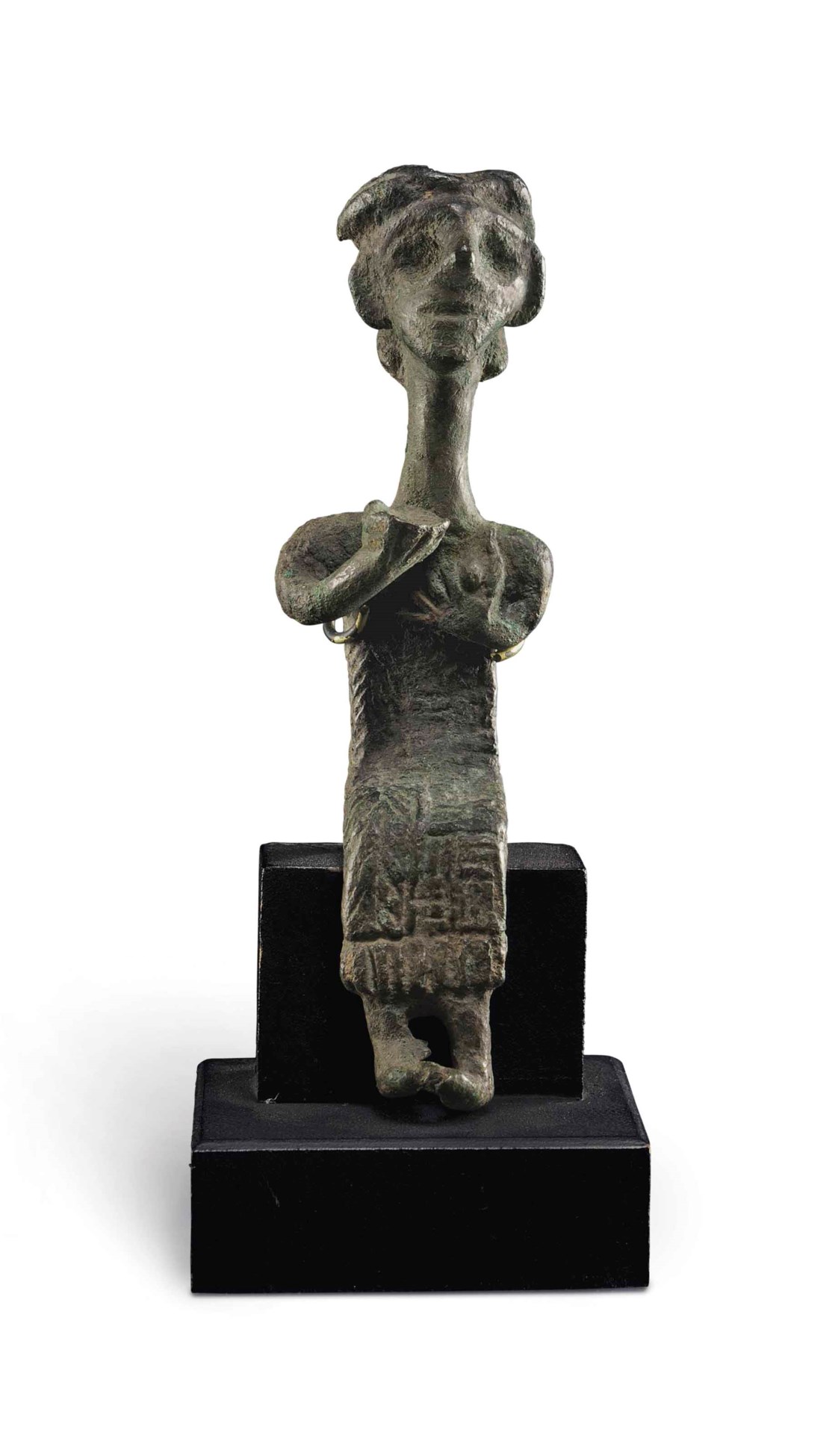 A SYRIAN BRONZE GODDESS , MIDDLE BRONZE AGE, EARLY TO MID 2ND