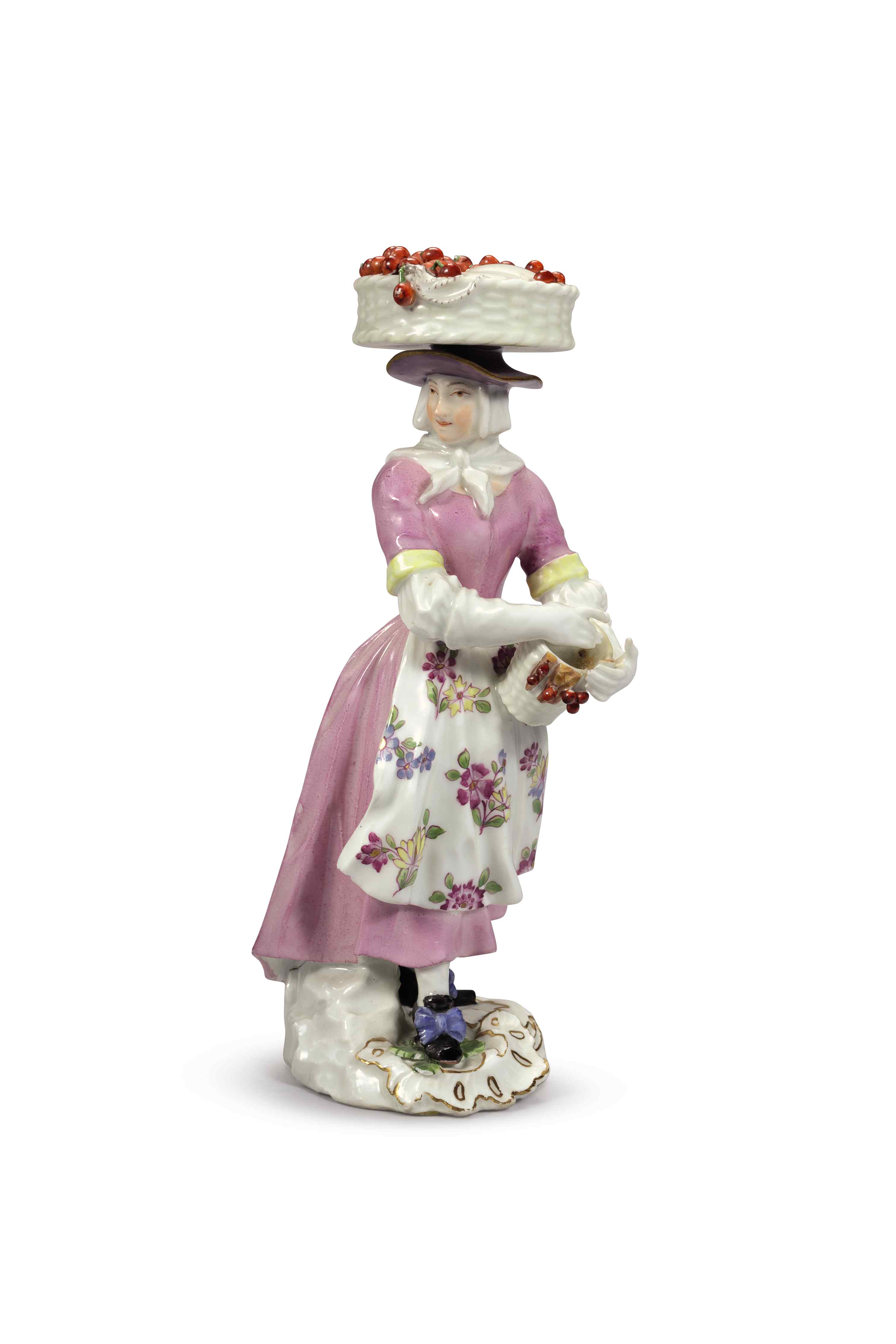 A MEISSEN PORCELAIN 'CRIES OF LONDON' FIGURE OF A CHERRY SELLER