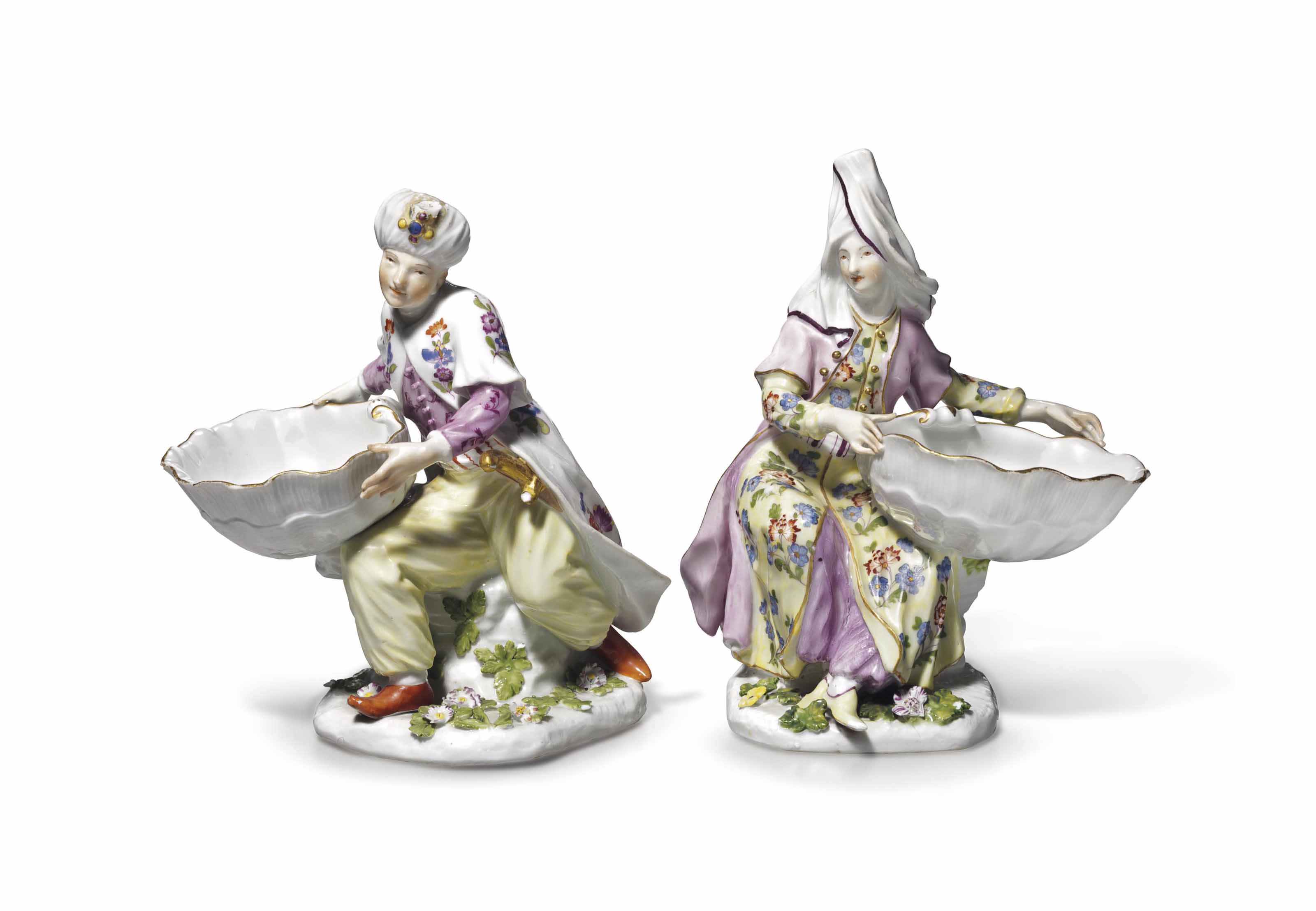 A MEISSEN PORCELAIN FIGURE OF A WAITER