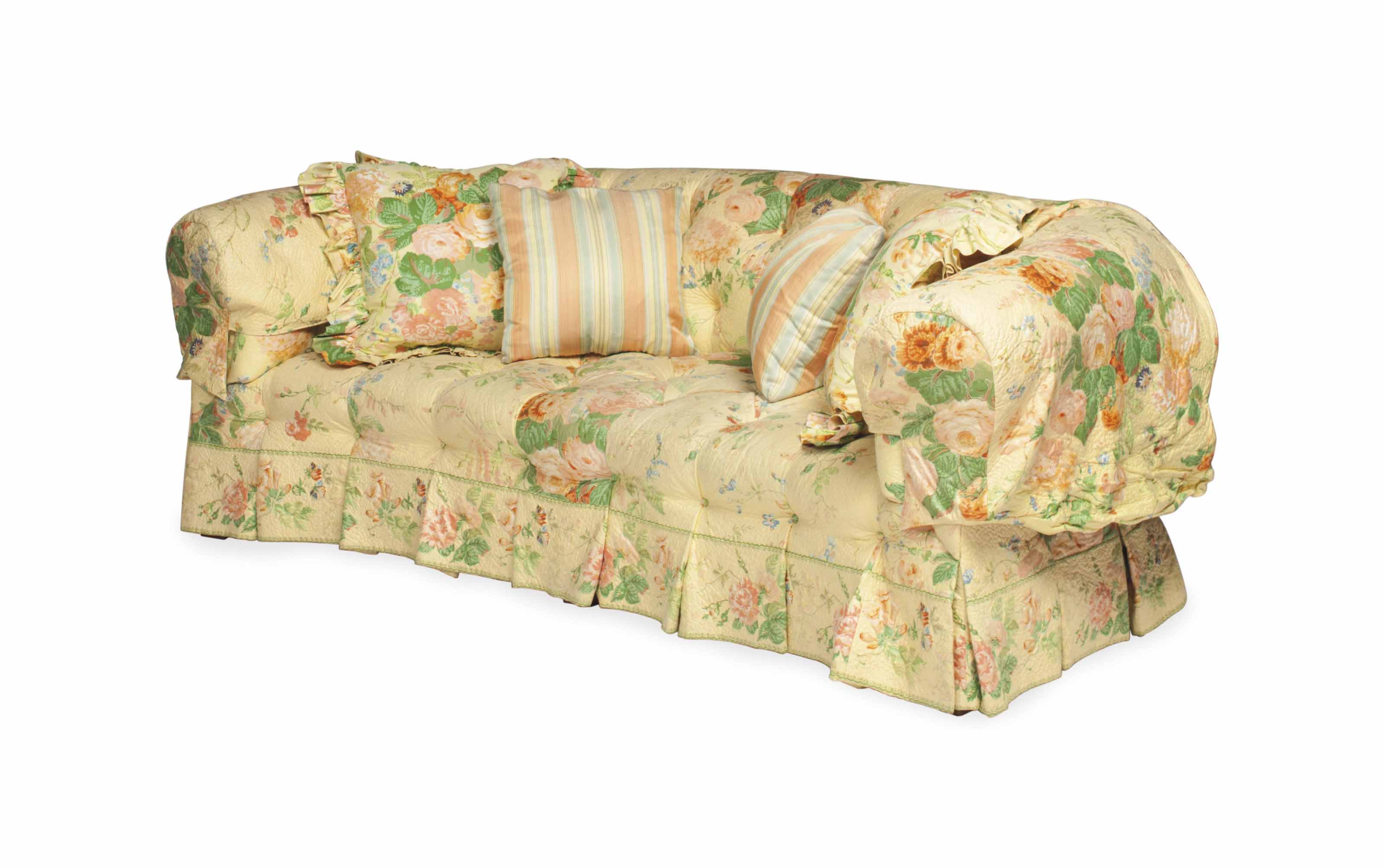 A BUTTONTUFTED SOFA COVERED IN QUILTED YELLOW CHINTZ, , MODERN
