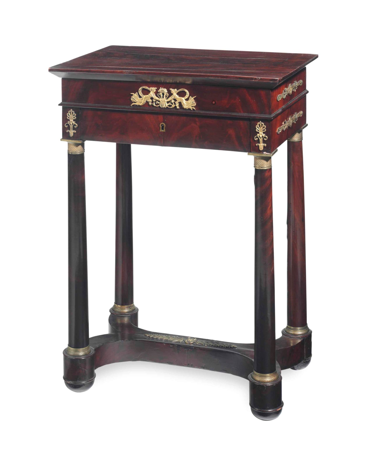 AN EMPIRE ORMOLUMOUNTED MAHOGANY LIFTTOP SMALL DRESSING TABLE,