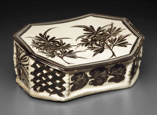 A Cizhou-type painted sgraffiato pillow, Song Dynasty (960-1279). 12  in (30.5  cm) long. Sold for $87,500 on 18-19 September 2014  at Christie&rsquo;s in New York