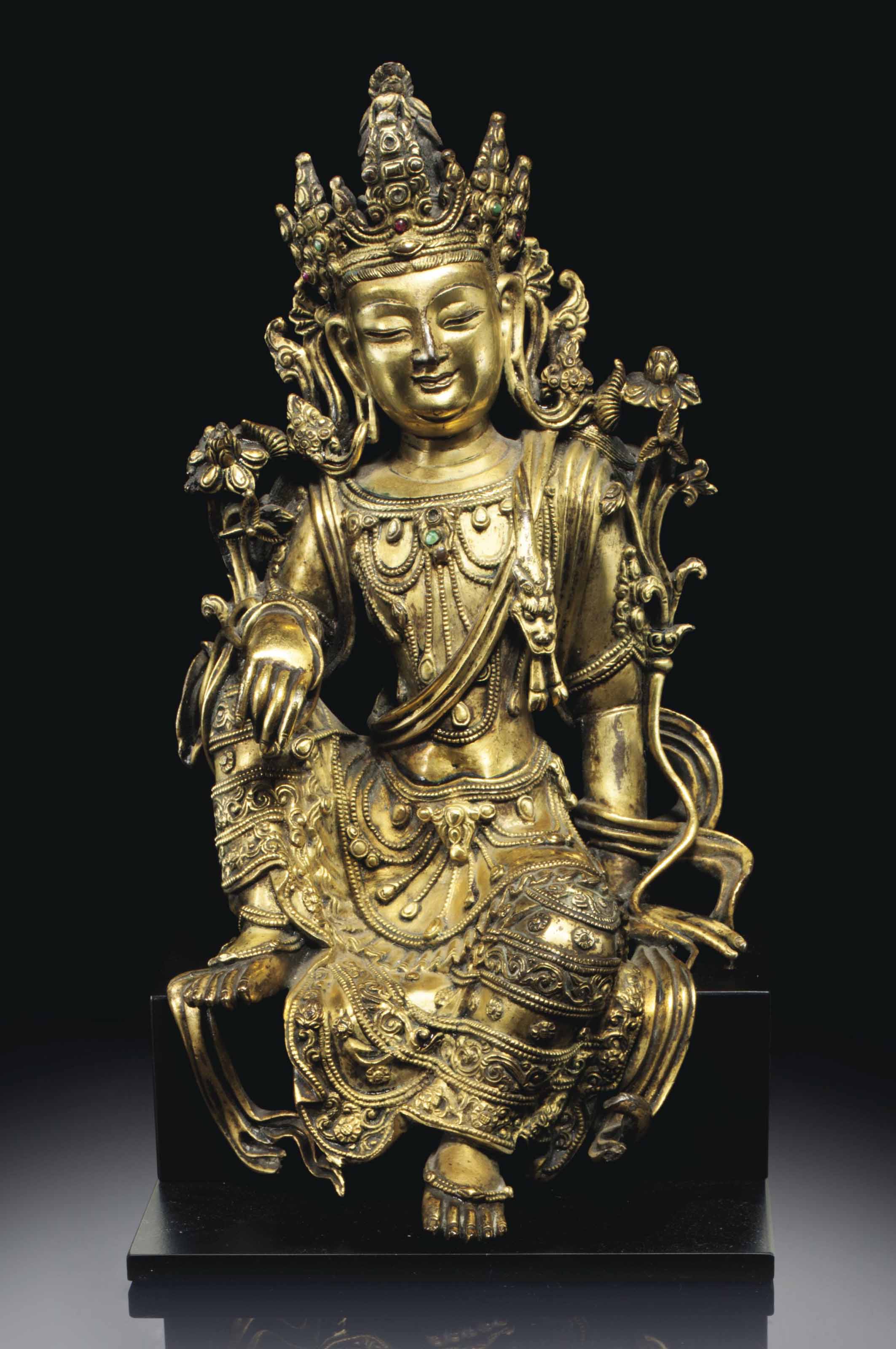 A FINELY CAST GILTBRONZE FIGURE OF AVALOKITESHVARA , MING DYNASTY