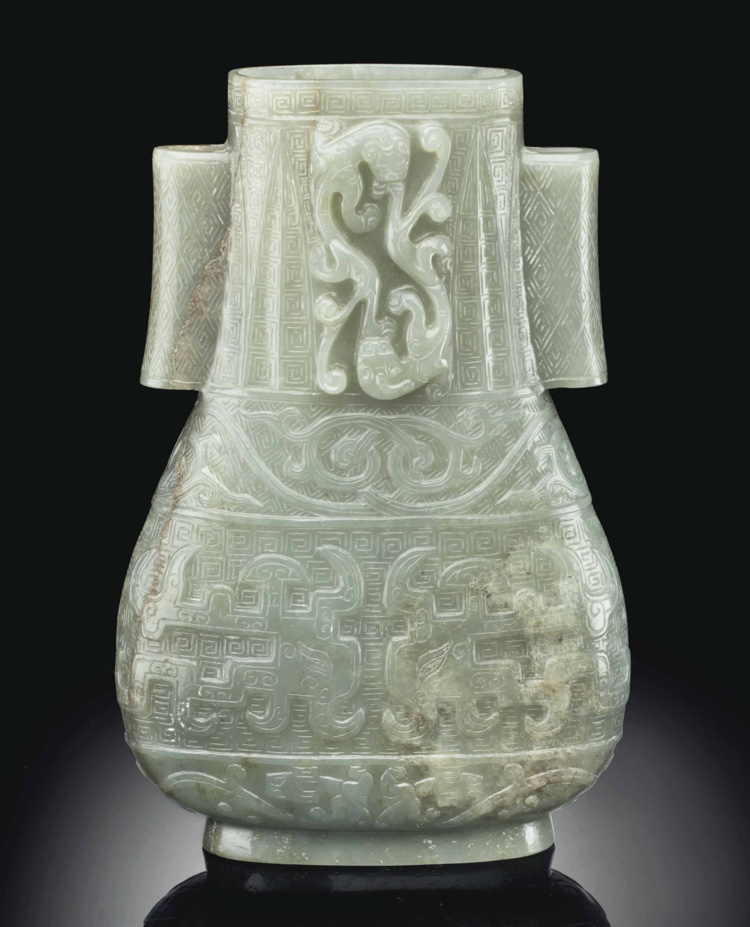 A GREYISHGREEN JADE ARCHAISTIC VASE , MING DYNASTY (13681644