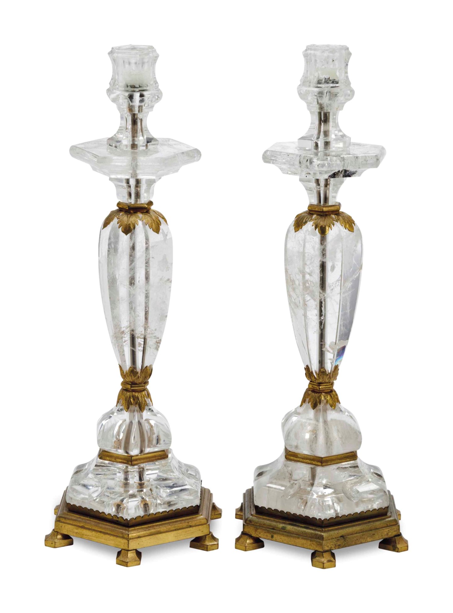 A PAIR OF GILT METALMOUNTED ROCK CRYSTAL CANDLESTICKS,