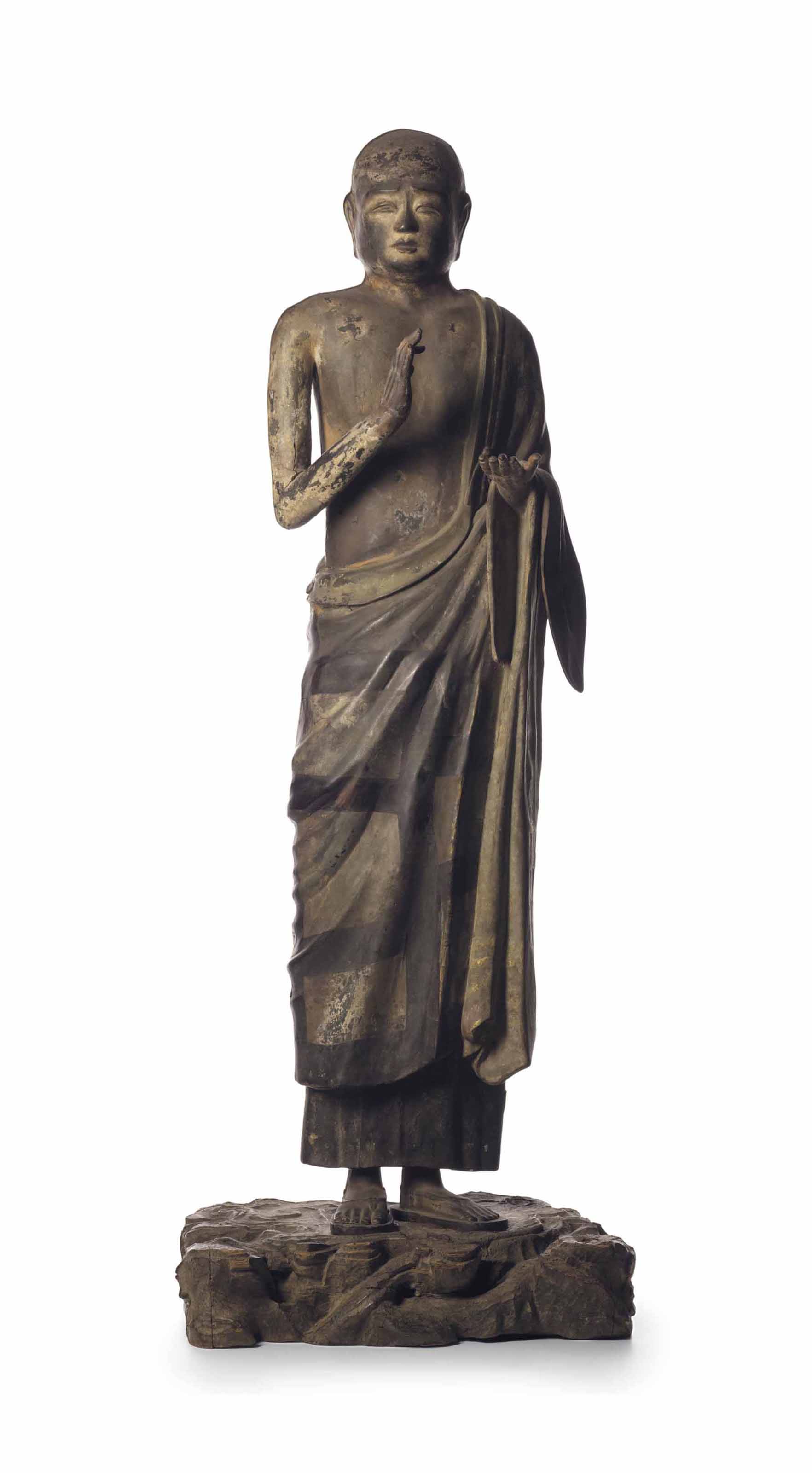 A DRY-LACQUER STANDING FIGURE OF ONE OF THE TEN DISCIPLES OF THE