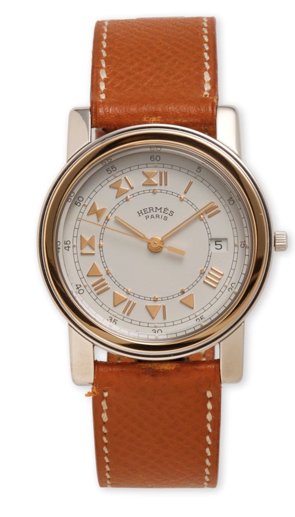 A STAINLESS STEEL & 18K GOLD PLATED CARRICK WATCH WITH GOLD  display picture 3