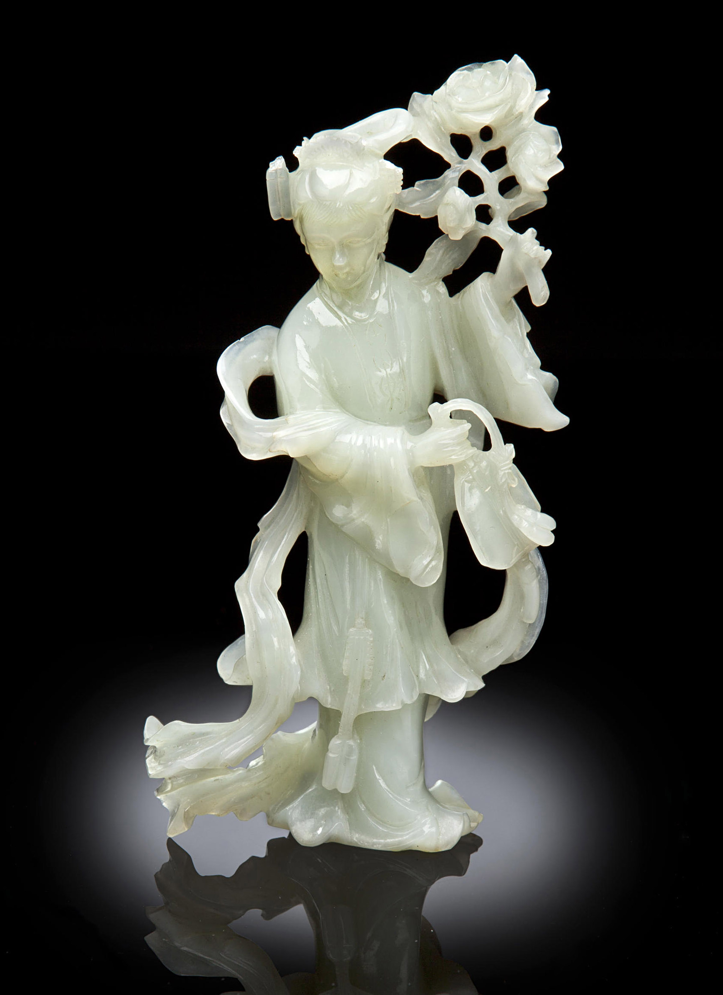 A WHITE JADE FIGURE OF A FEMALE IMMORTAL, Christie’s