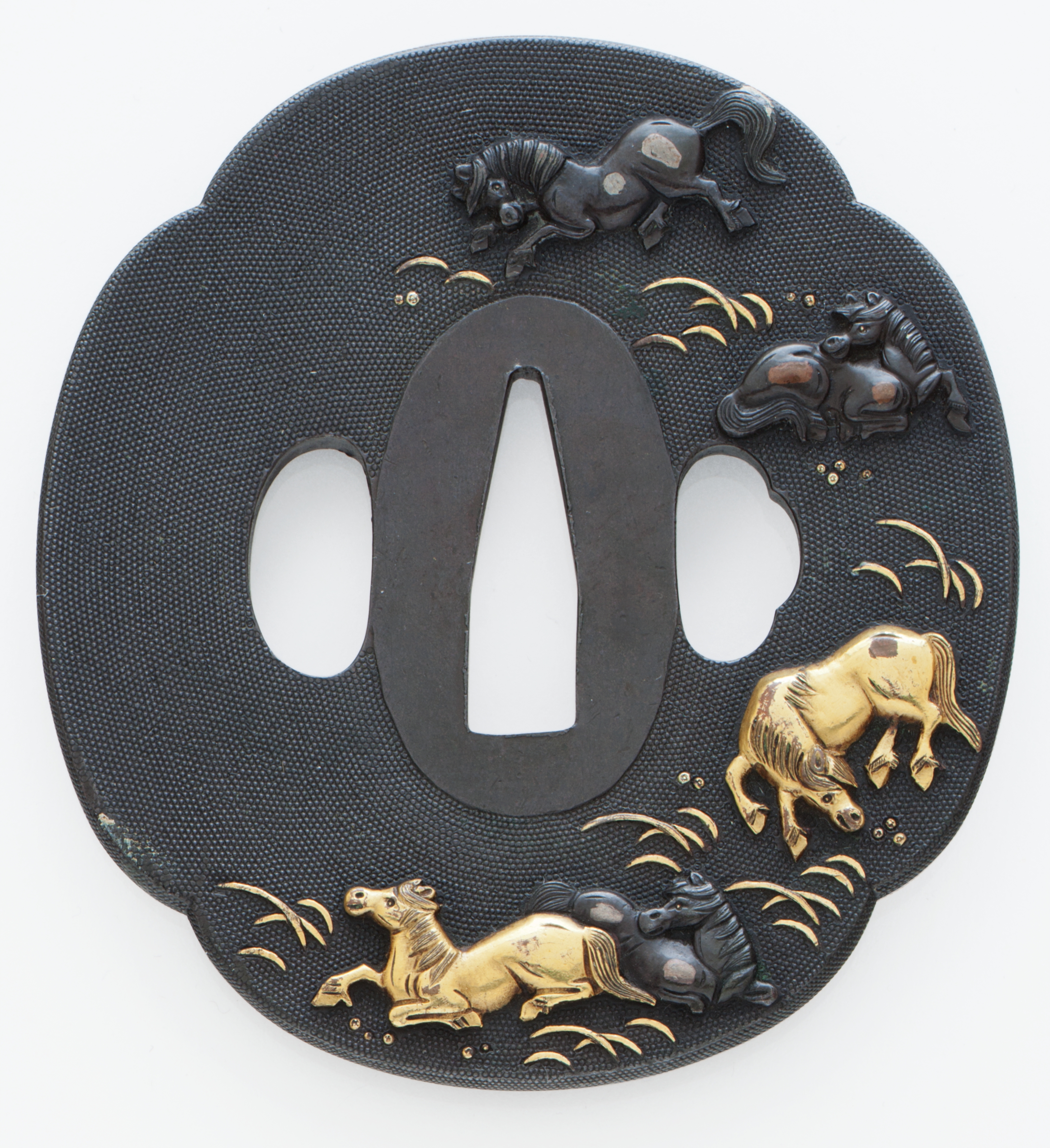 A mokko shaped shakudo tsuba, EDO PERIOD (19TH CENTURY) | Christie's
