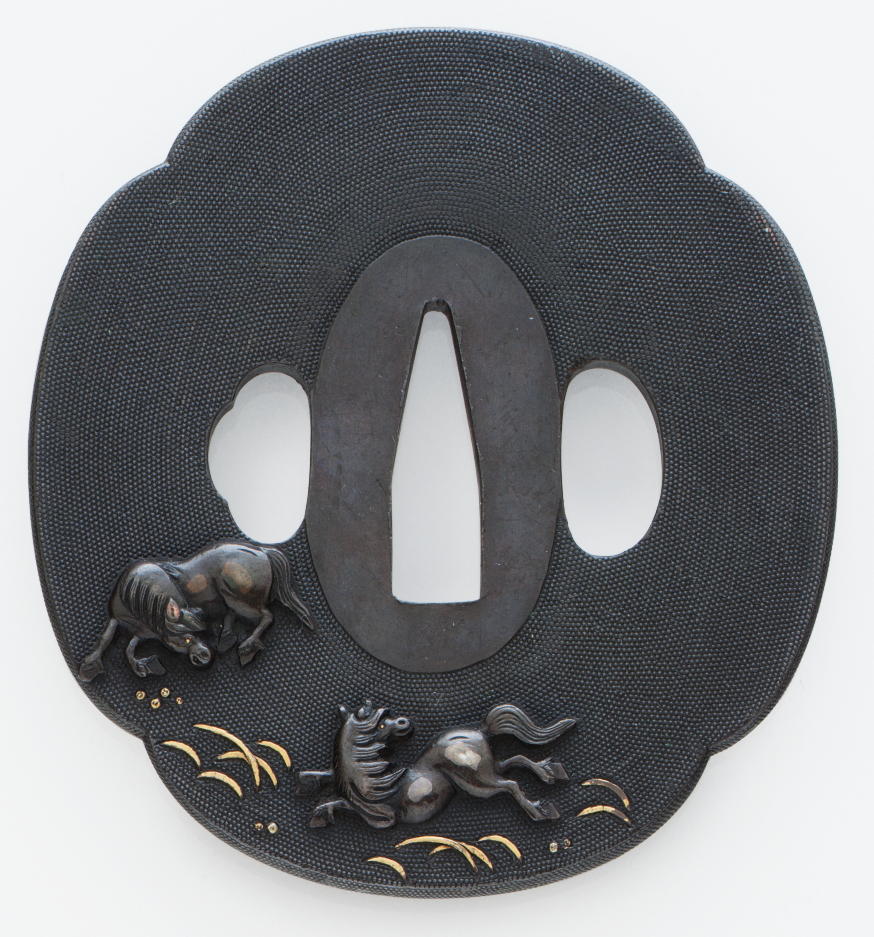 A mokko shaped shakudo tsuba, EDO PERIOD (19TH CENTURY) | Christie's