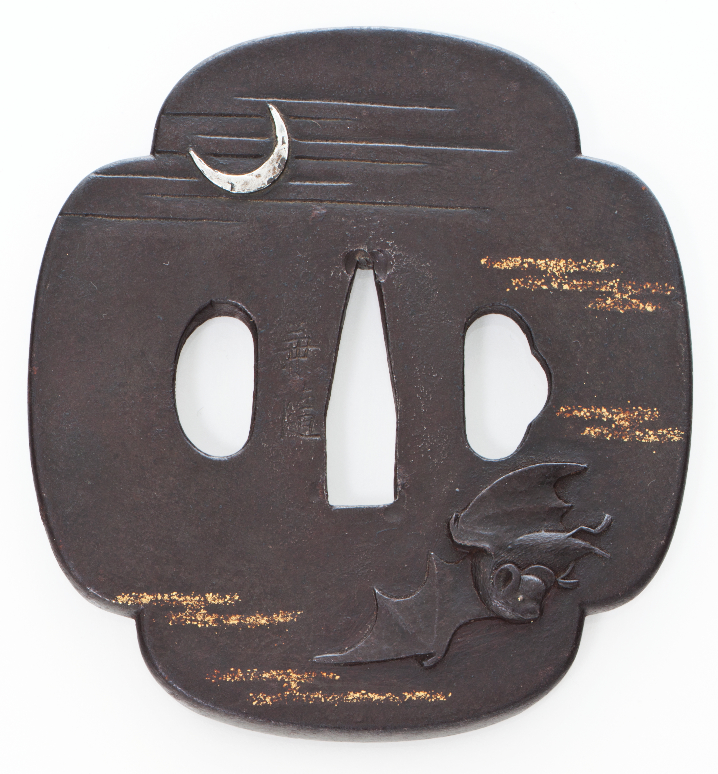 A mokko shaped russet iron tsuba, SIGNED KENZUI, MEIJI PERIOD