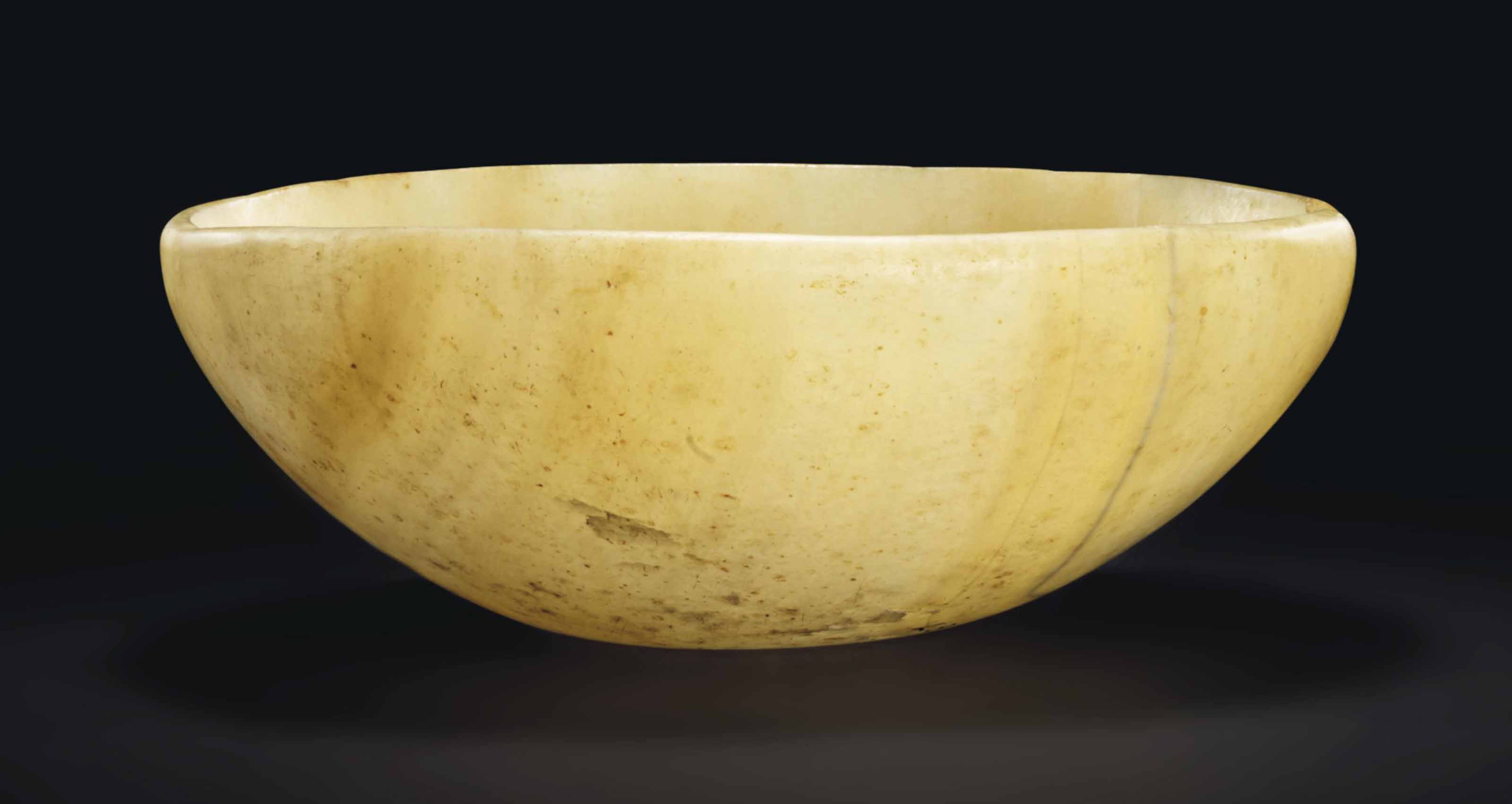AN EGYPTIAN ALABASTER BOWL