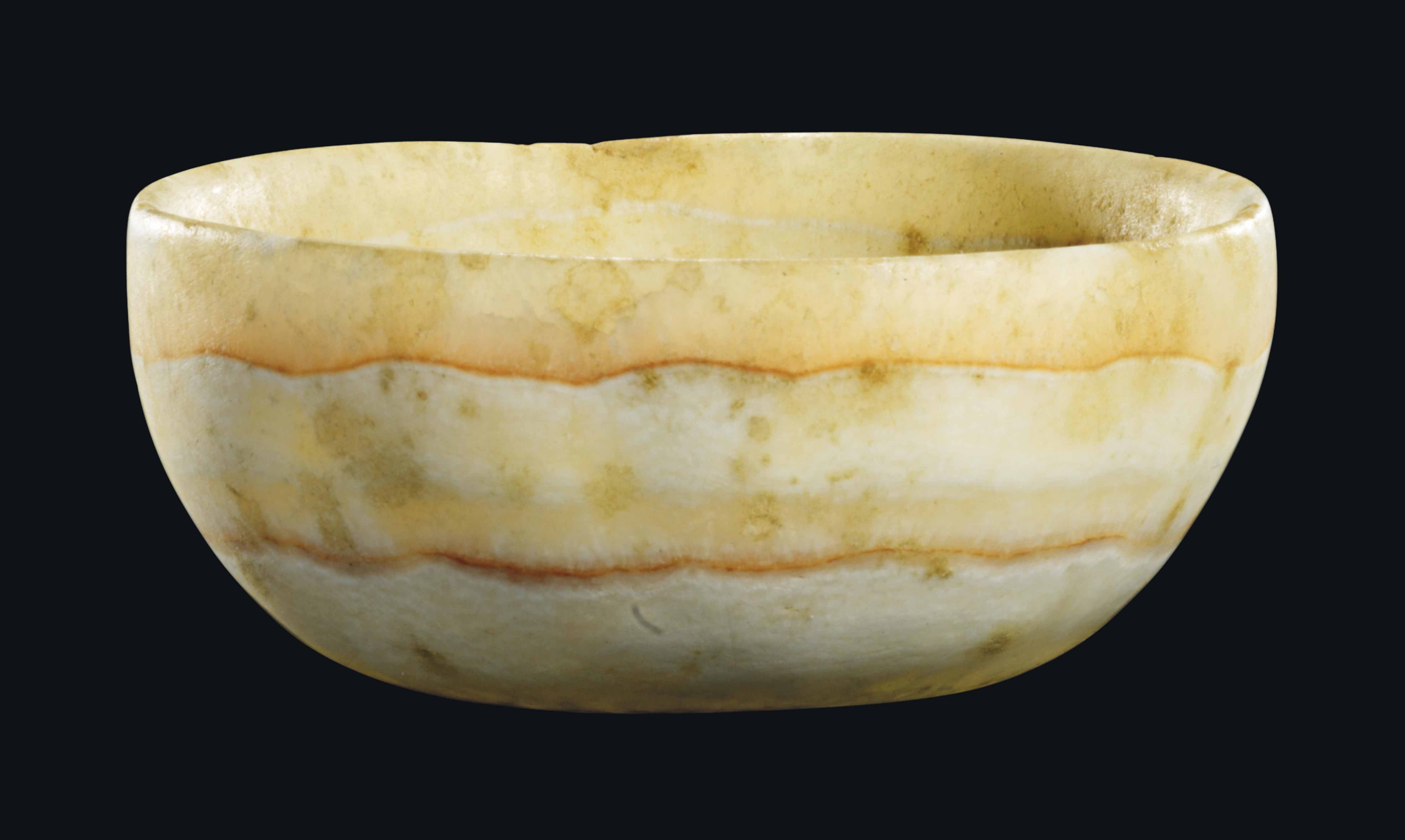 AN EGYPTIAN ALABASTER BOWL , OLD KINGDOM, 4TH6TH DYNASTY, CIRCA 2613
