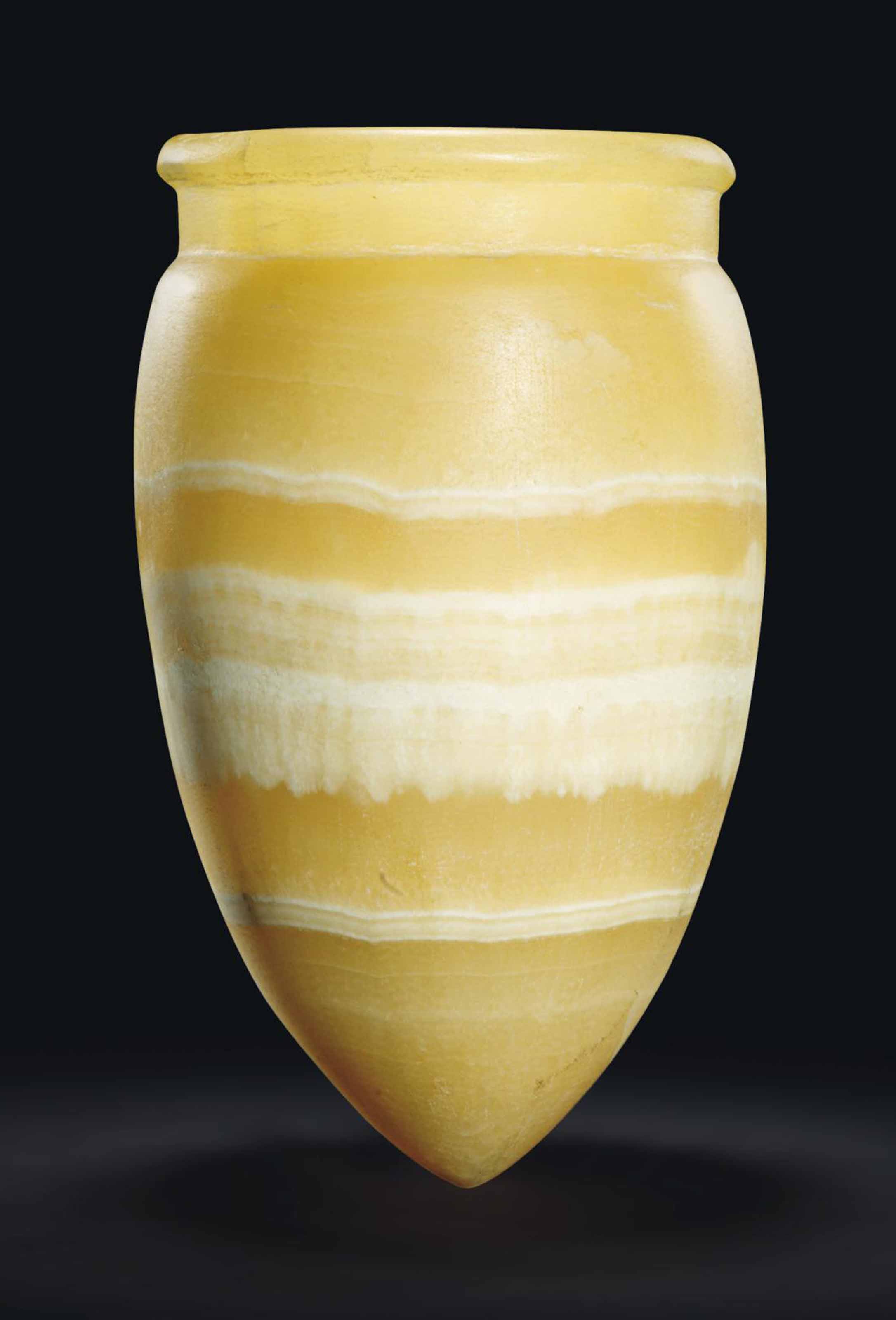 AN EGYPTIAN ALABASTER JAR , NEW KINGDOM, 18TH20TH DYNASTY, CIRCA 1550