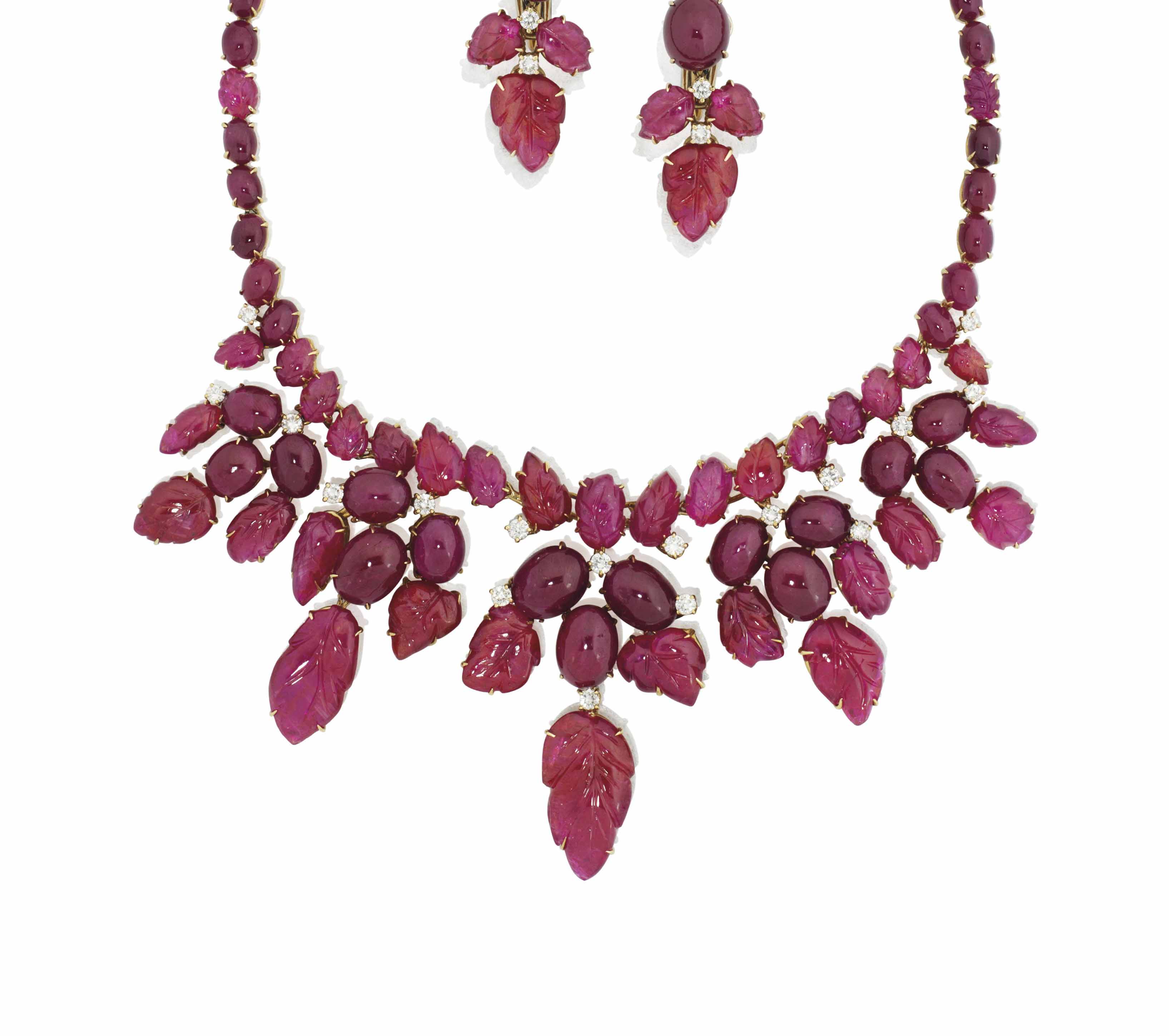 A SUITE OF CARVED RUBY JEWELLERY Christie's