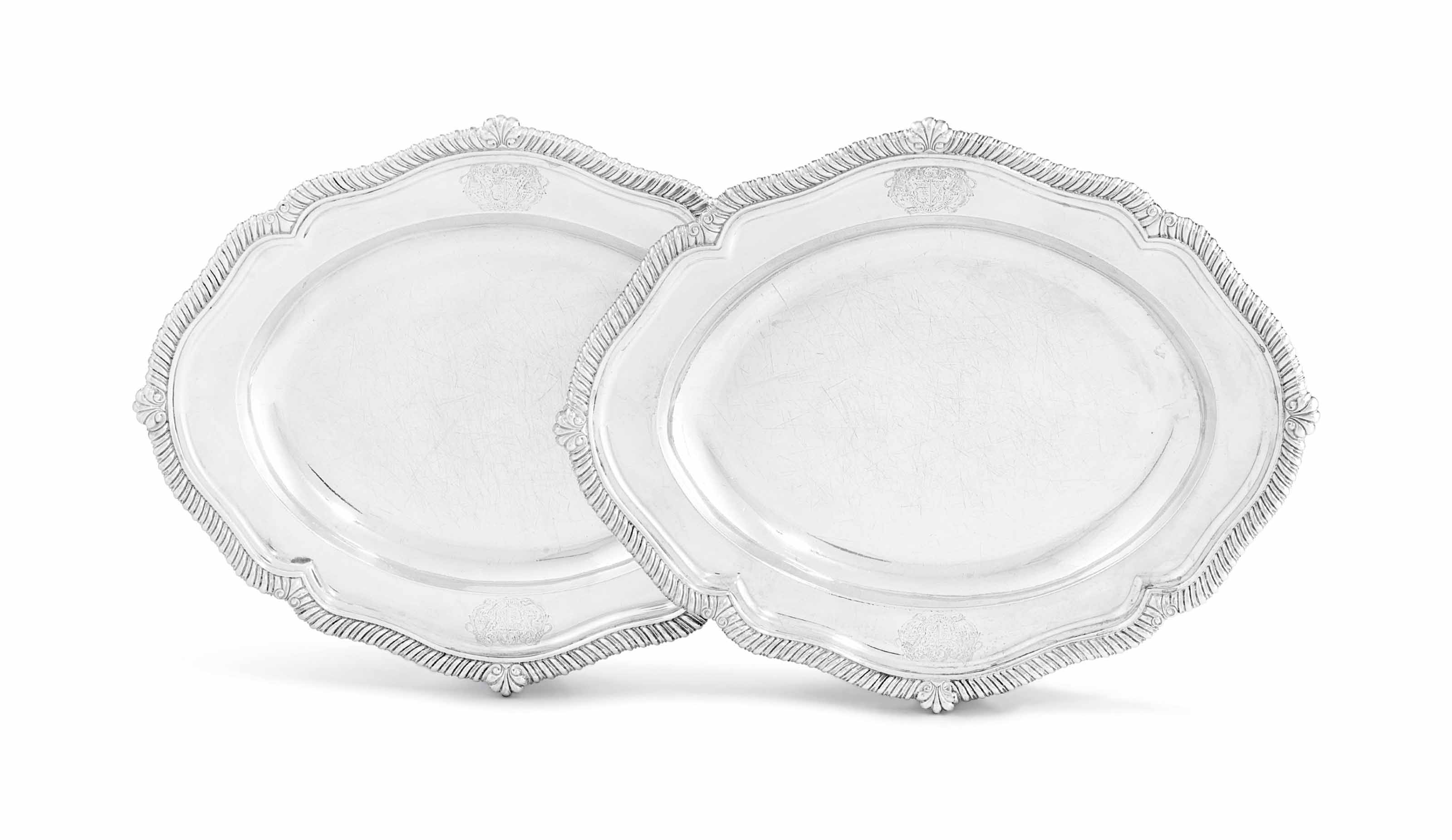 A PAIR OF GEORGE III SILVER MEAT-DISHES A PAIR OF GEORGE III SILVER MEAT-DISHES