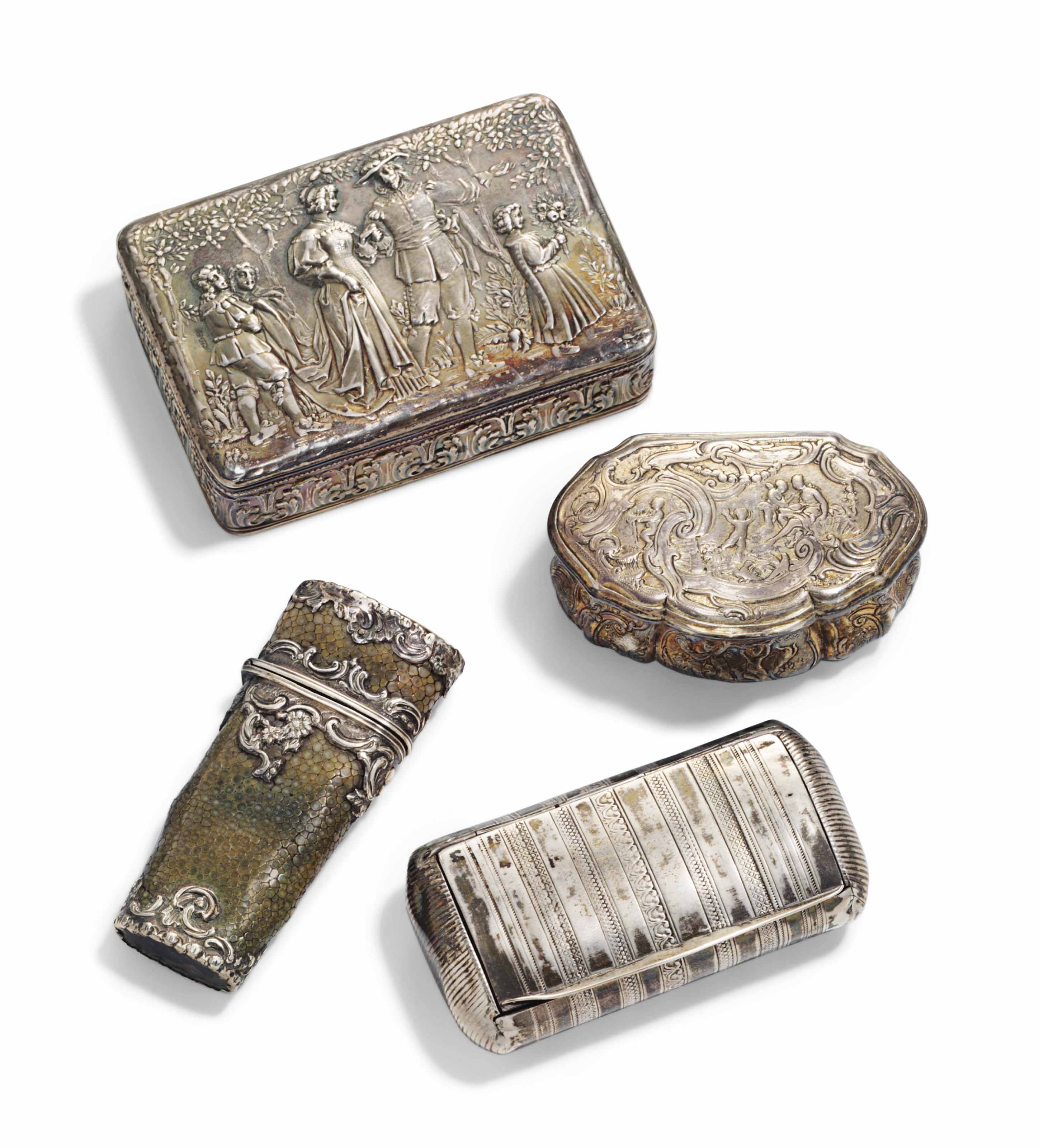A GROUP OF SILVER SNUFFBOXES AND A SILVERMOUNTED ETUI , CIRCA 1800
