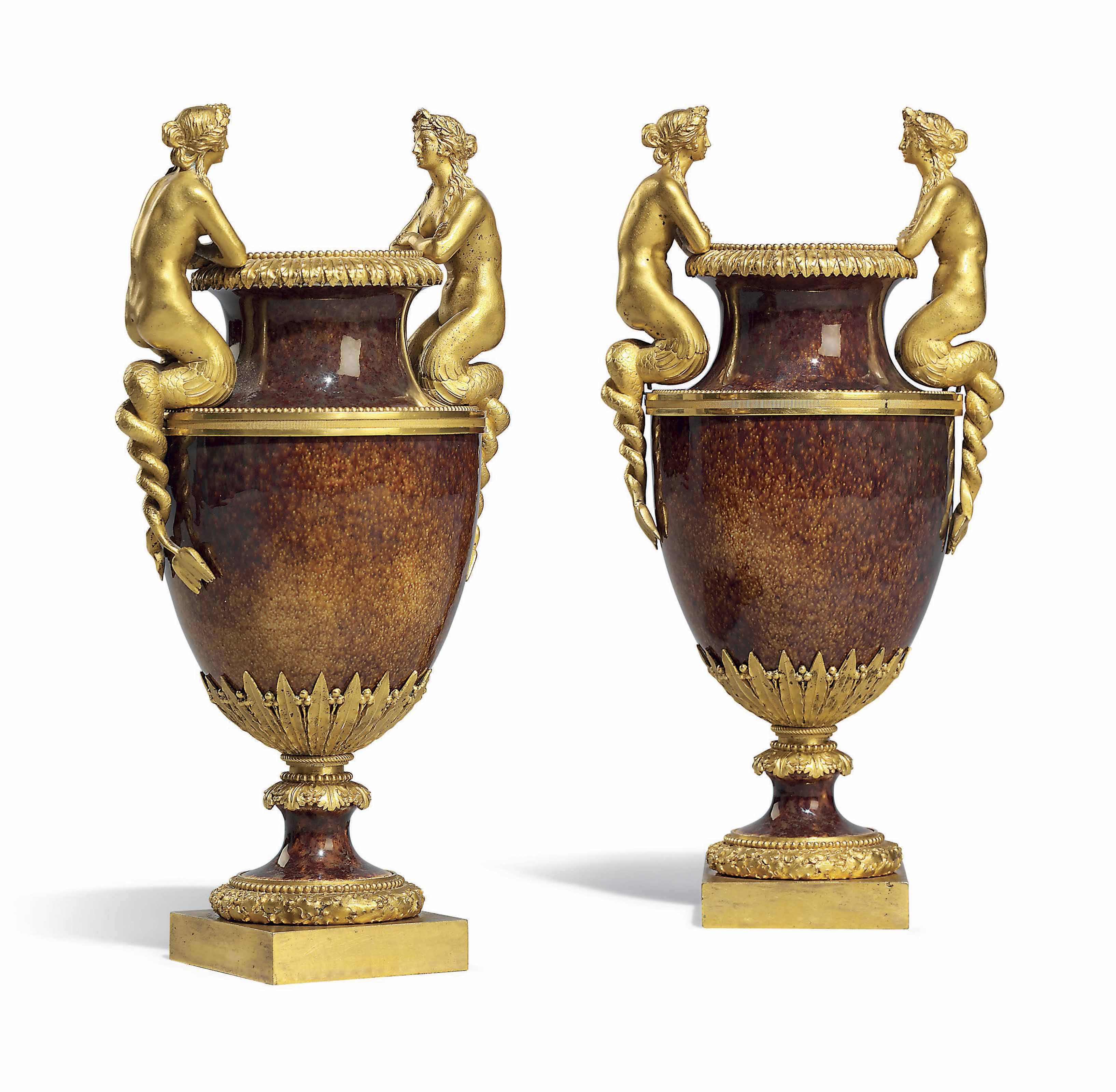 A PAIR OF LOUIS XVI ORMOLU-MOUNTED SEVRES 'FOND ECAILLE' PORCELA