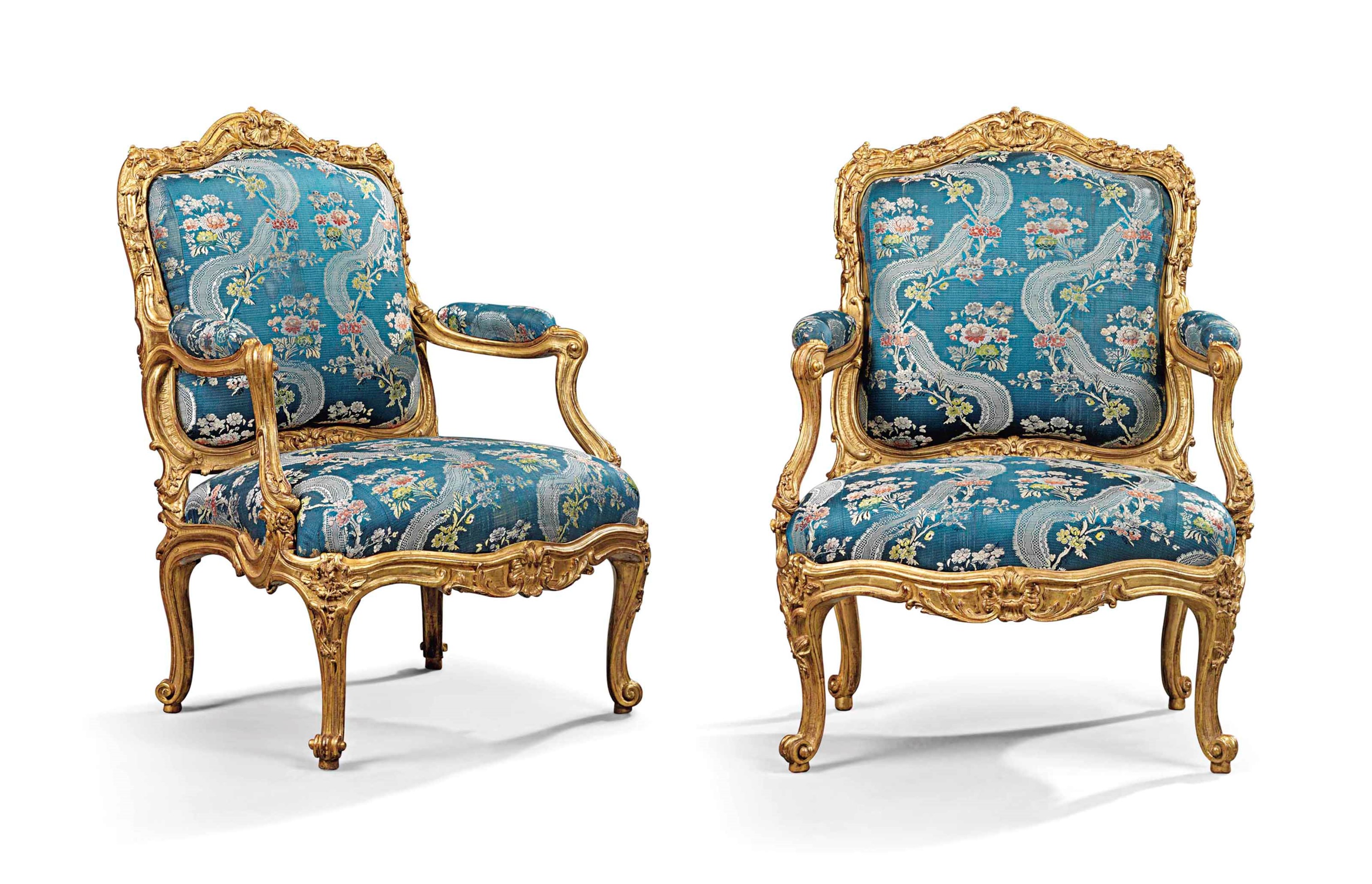 A PAIR OF LOUIS XV GILTWOOD FAUTEUILS A LA REINE