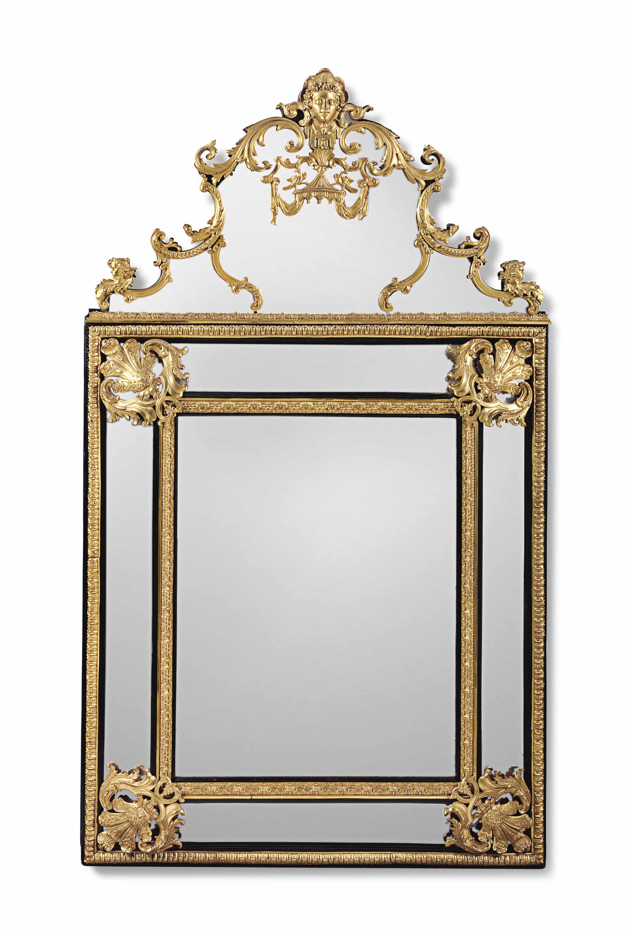 A FRENCH ORMOLUMOUNTED EBONISED MIRROR