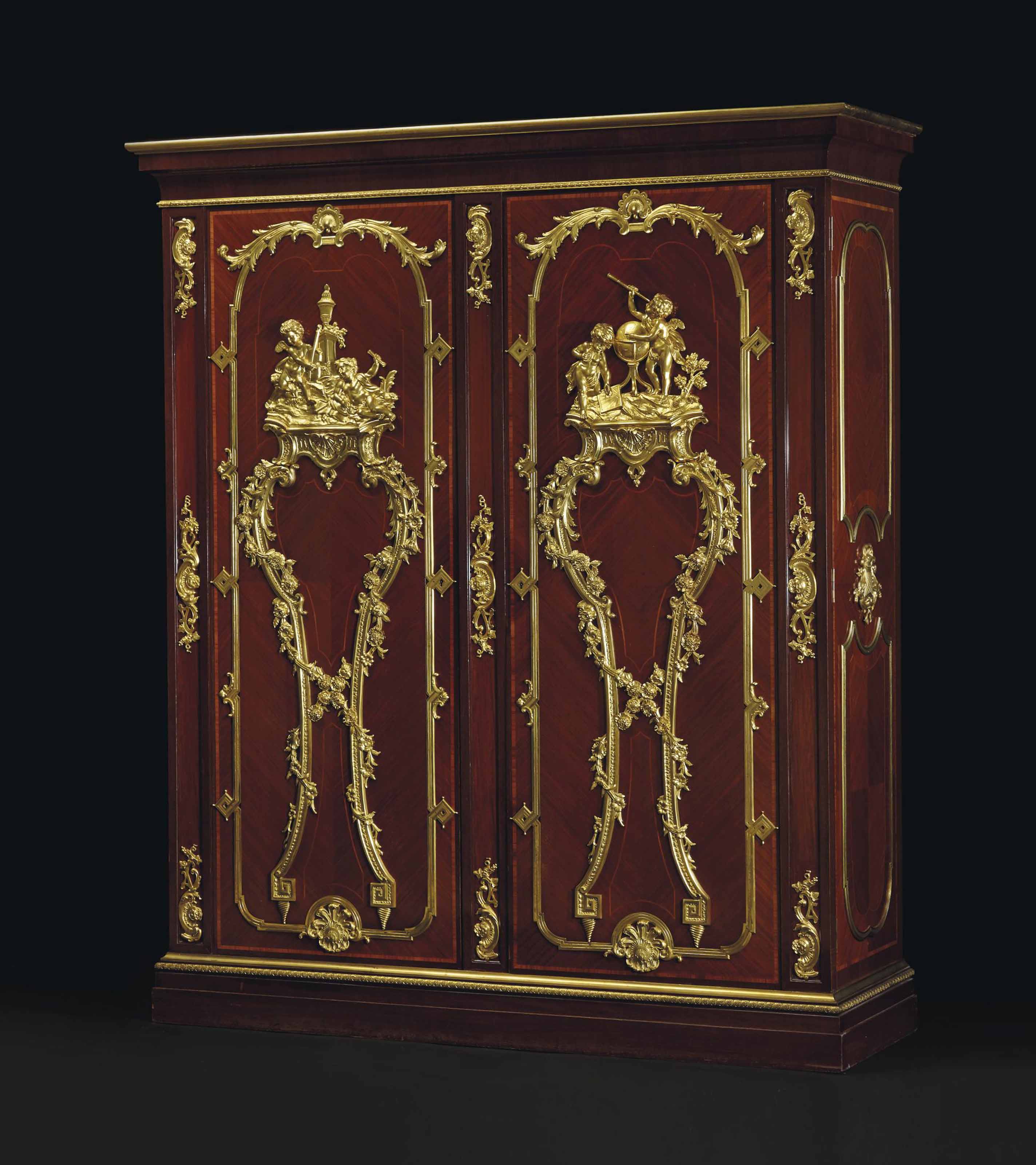 A French Ormolu Mounted Kingwood Tulipwood And Amaranth Armoire