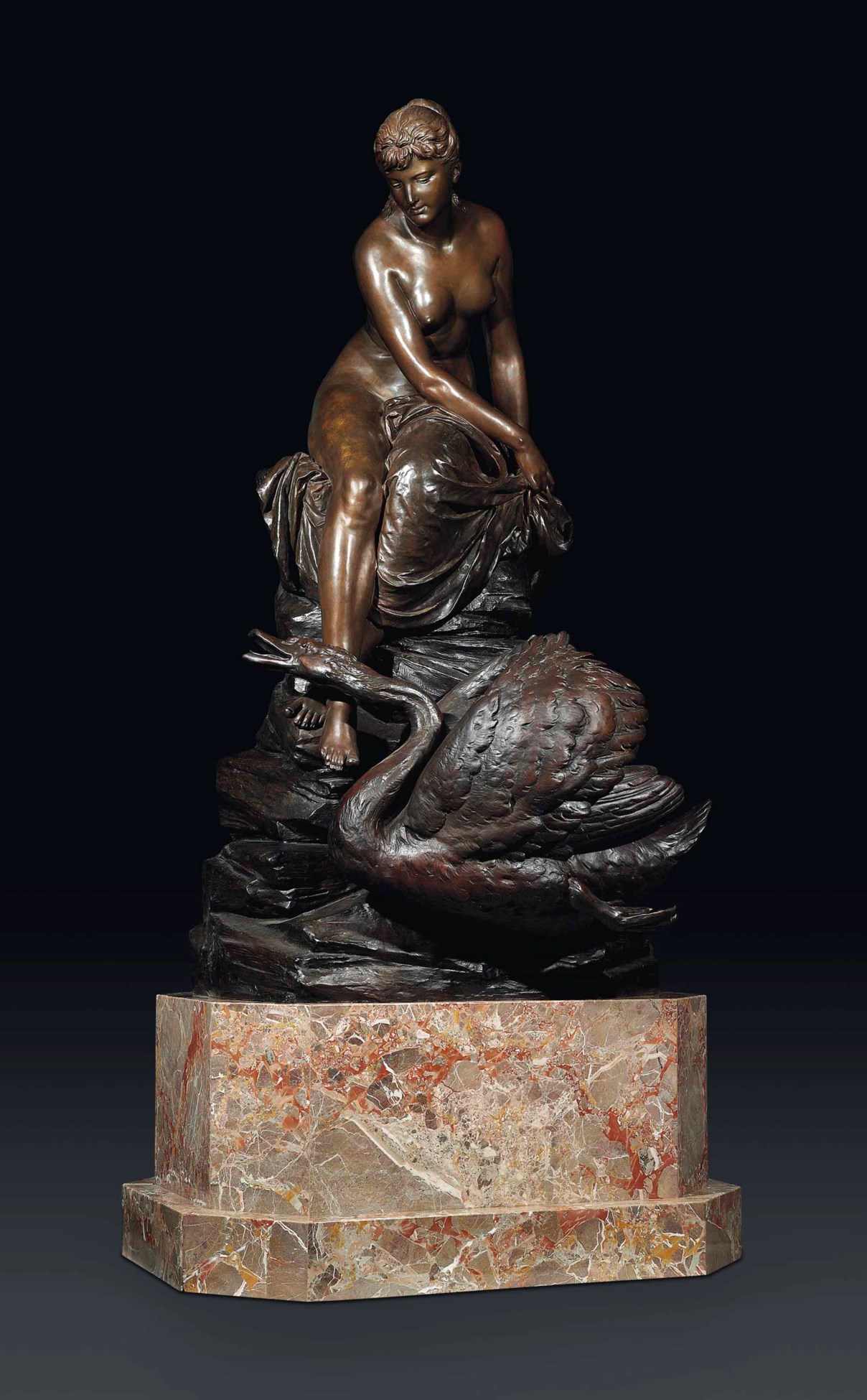 A GERMAN PATINATEDBRONZE GROUP REPRESENTING LEDA AND THE SWAN, CAST