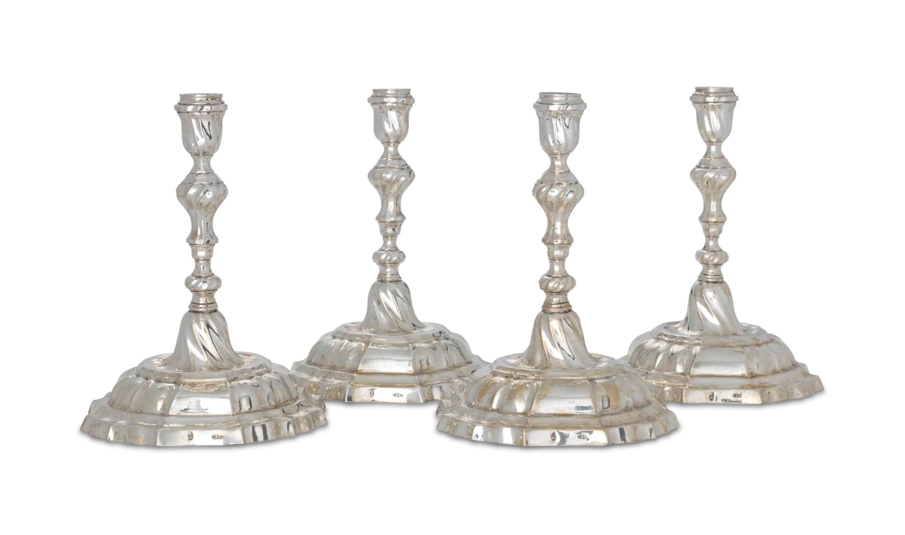 A SET OF FOUR GERMAN SILVER CANDLESTICKS, MARK OF JOHANN BALTHASAR