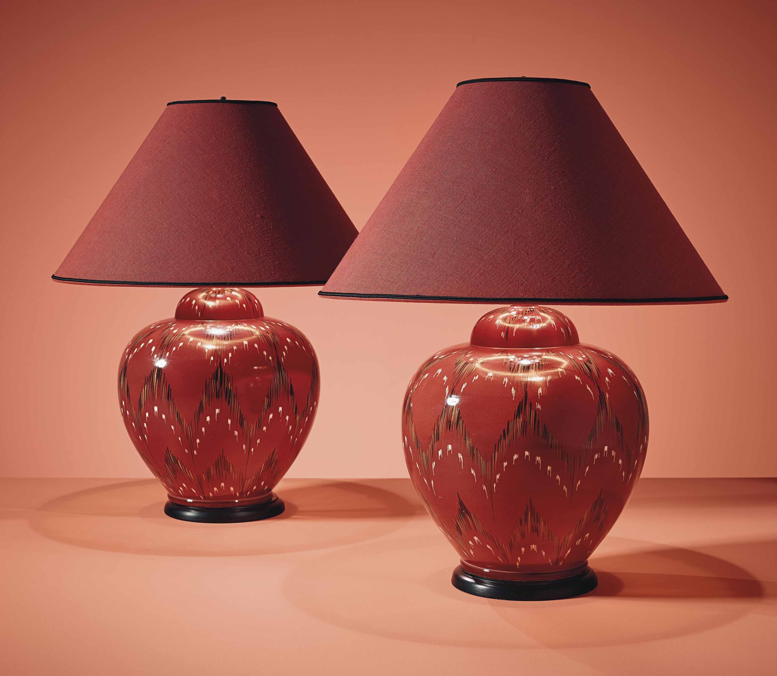 A PAIR OF RED LACQUERED LAMPS , LATE 20TH CENTURY Christie's