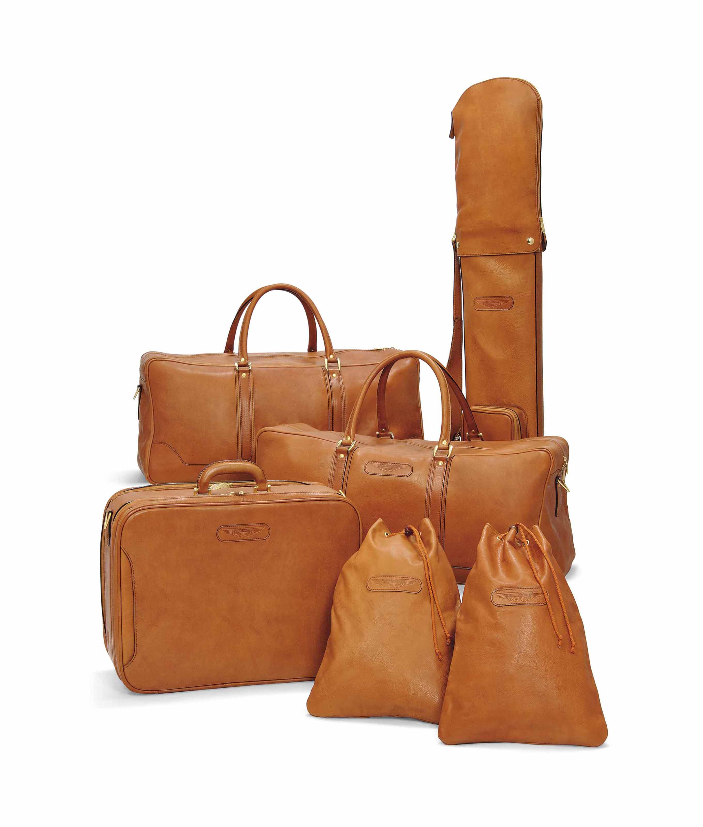 Tan leather luggage hotsell
