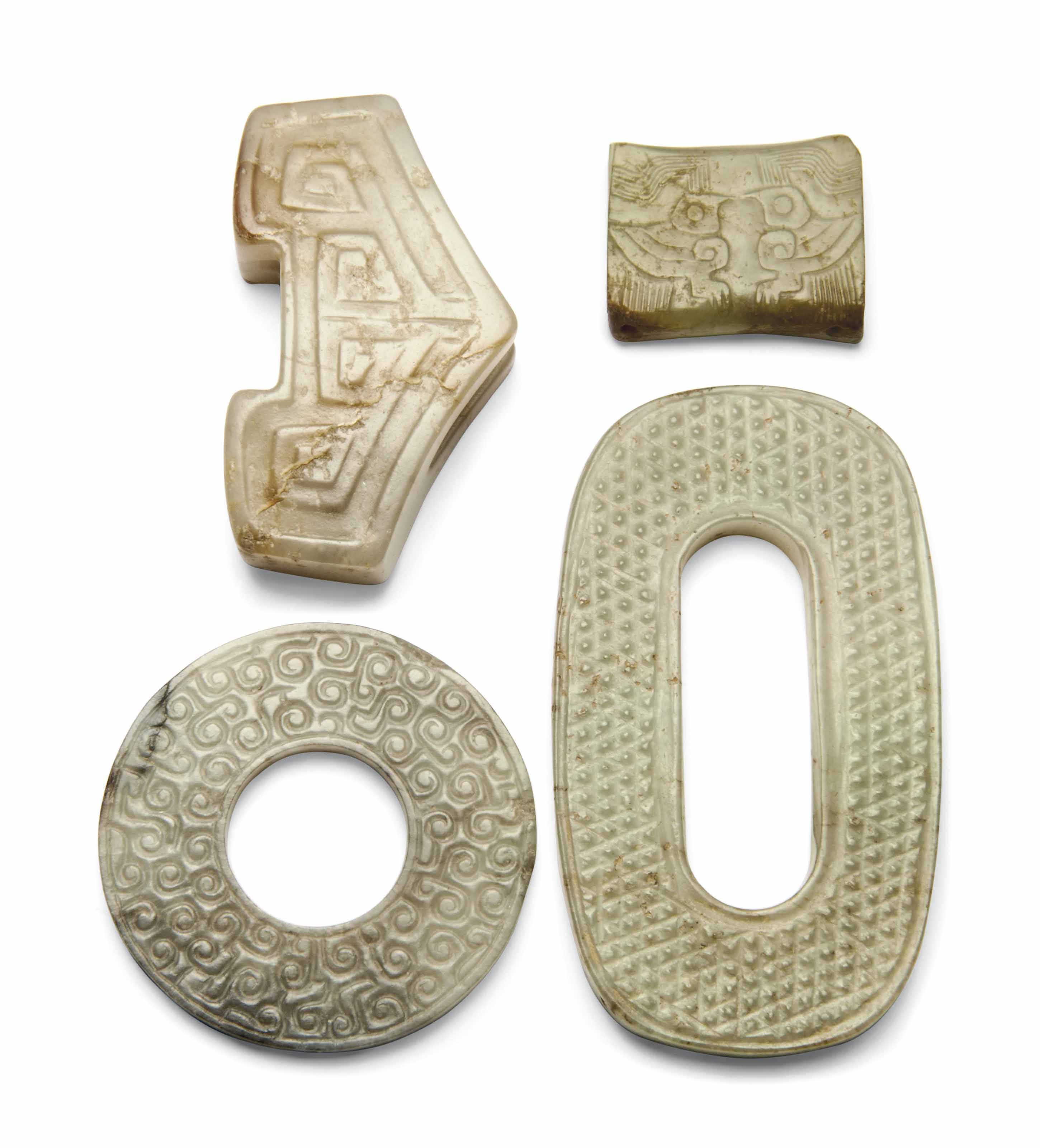 FOUR JADE CARVINGS , SHANG DYNASTYSIX DYNASTIES PERIOD (CIRCA BC 1600