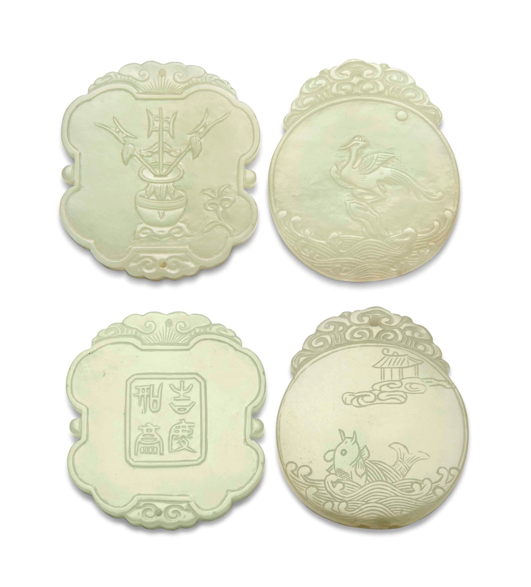 TWO CARVED JADE PLAQUES