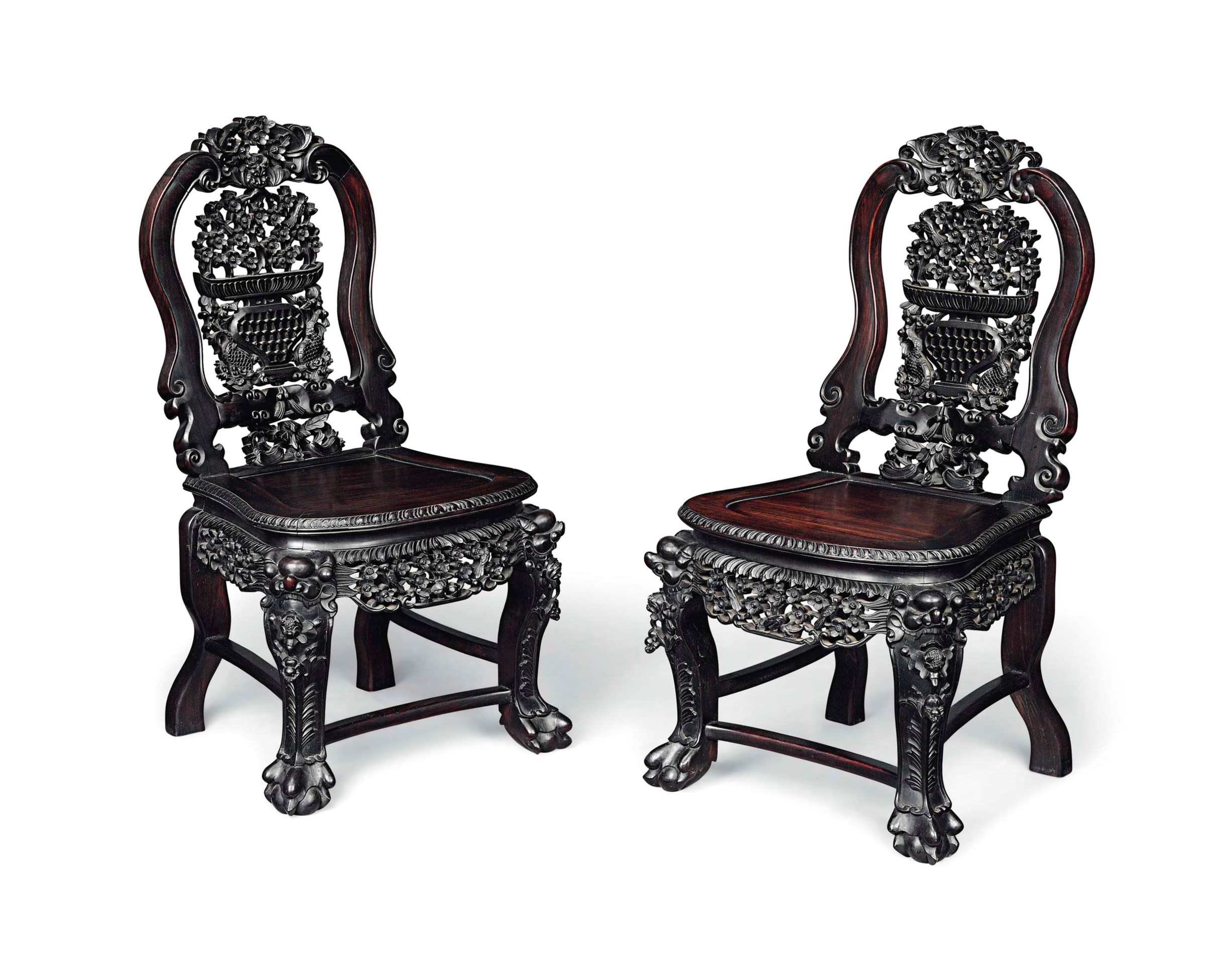 A PAIR OF HARDWOOD CARVED CHAIRS