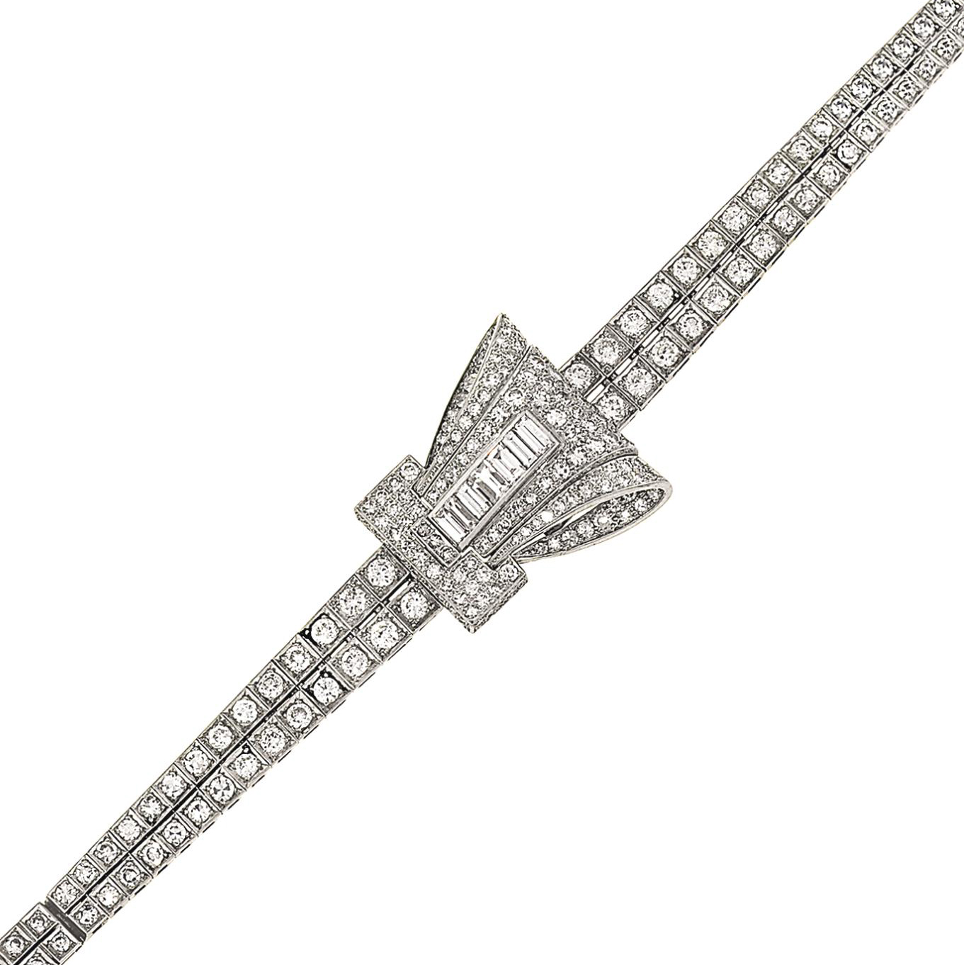 A lady's platinum and diamond bracelet watch, by International W