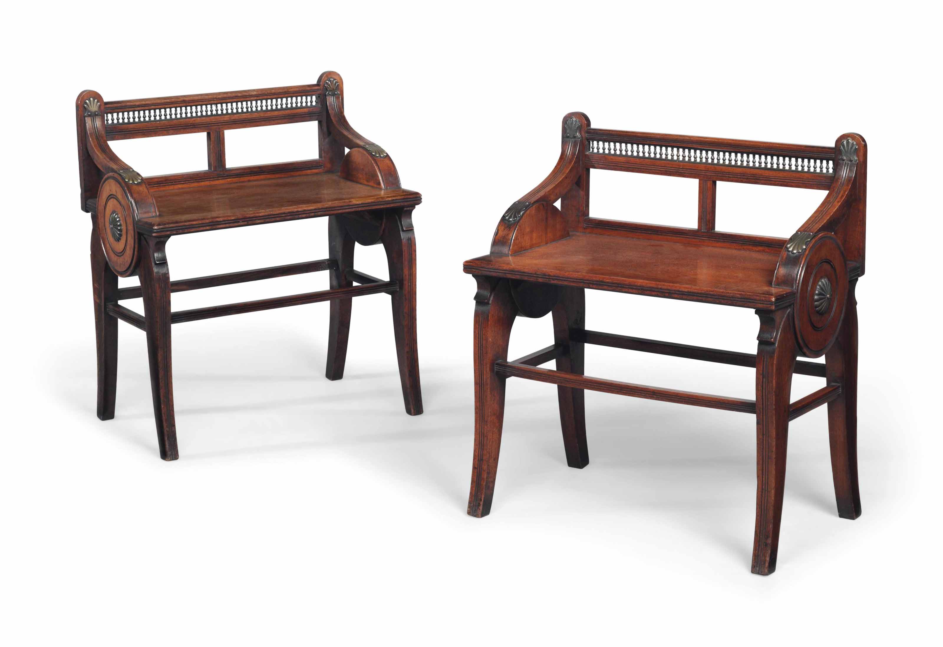 A NEAR PAIR OF BRASSMOUNTED WALNUT HALL STOOLS , BY JAMES SHOOLBRED