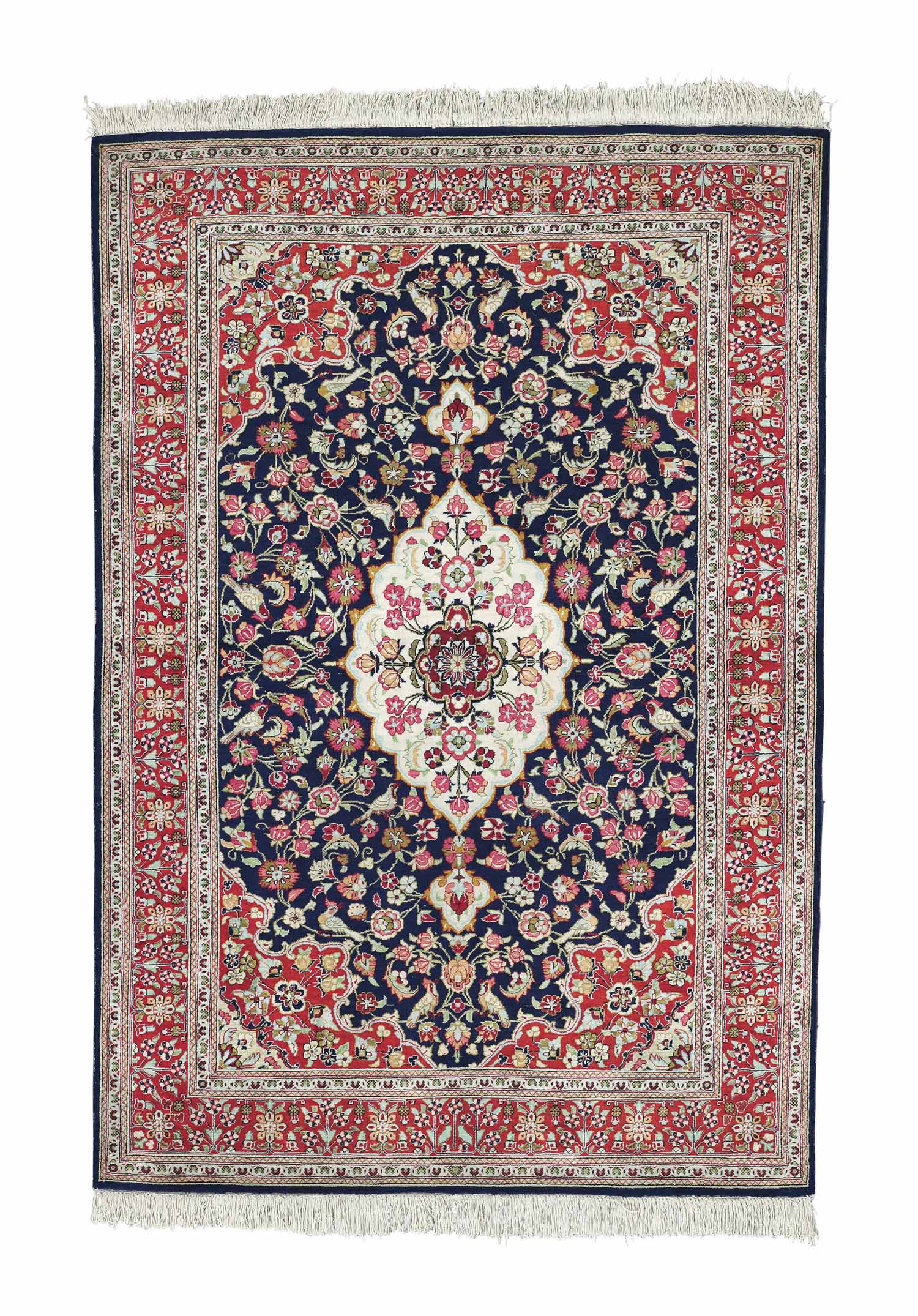 An extremely fine silk Qum rug & part silk Isfahan rug Christie's