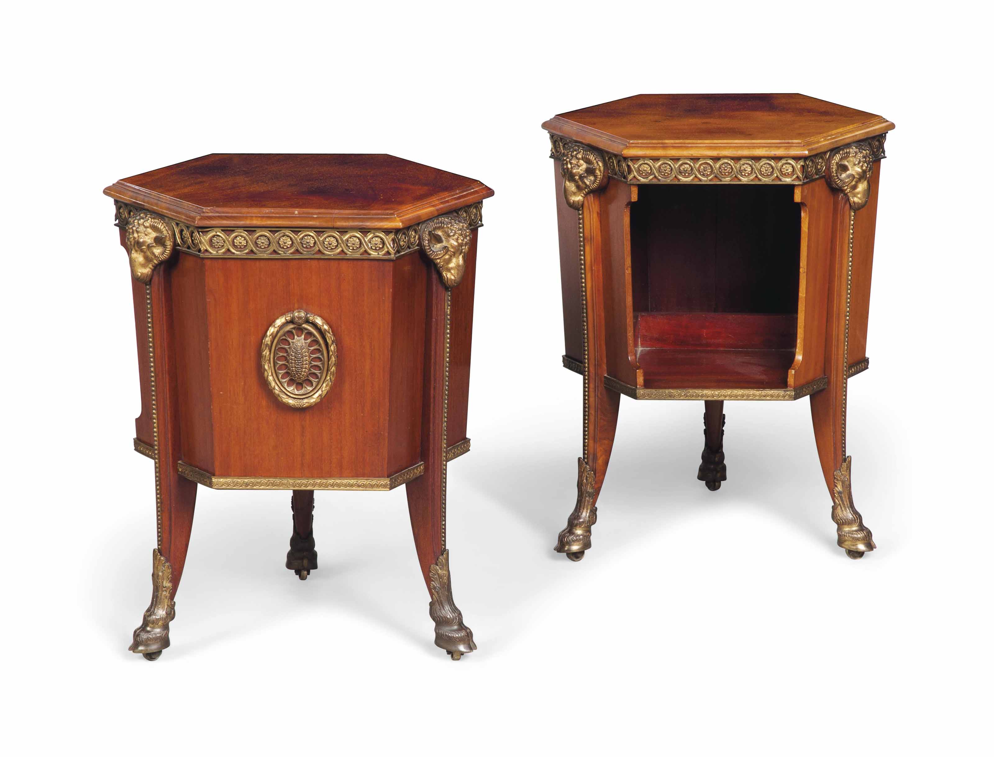 A PAIR OF LATE VICTORIAN GILTBRONZE MOUNTED MAHOGANY BEDSIDE TABLES